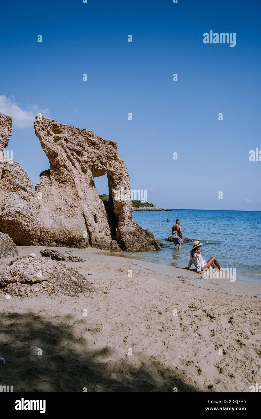 Istron Tropical beach of Voulisma beach, Istron, Crete, Greece, couple on ...