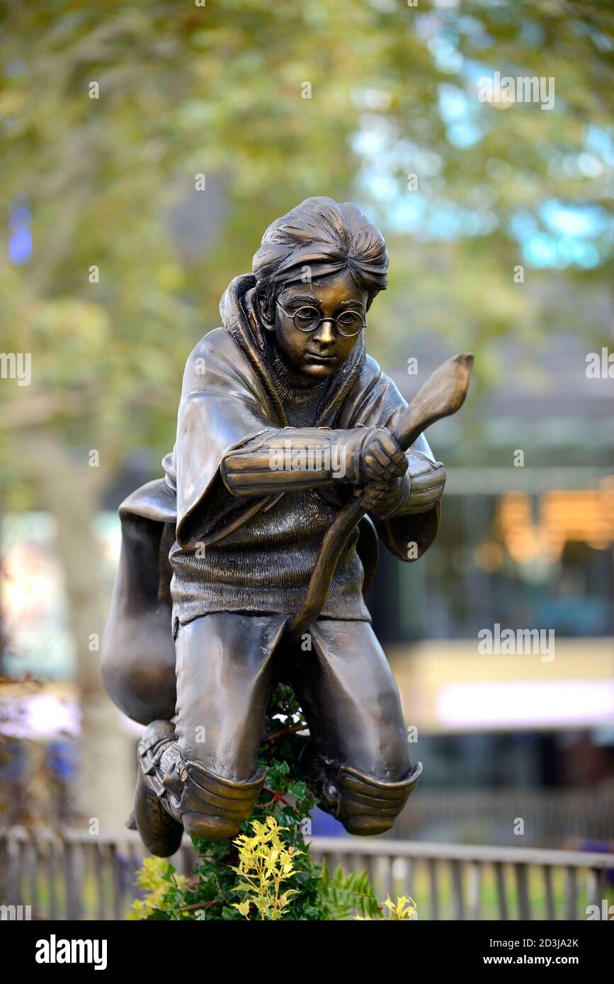 London, England, UK. Harry Potter (Daniel Radcliffe) bronze statue in Leicester Square, latest addition to the Scenes In The Square trail (unveiled Oc Stock Photo