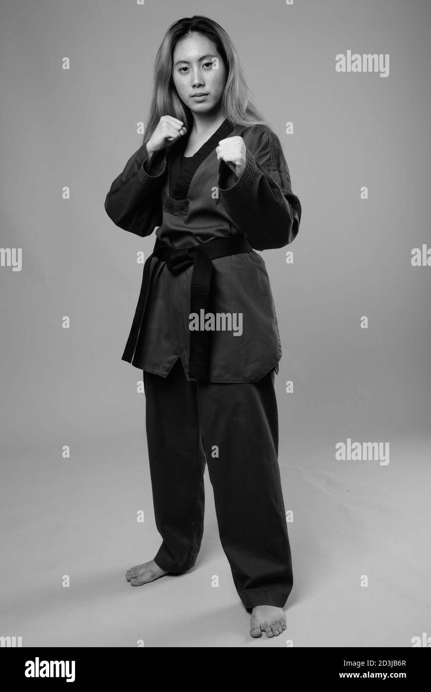 Portrait of young Asian woman wearing karate Gi ready to fight Stock Photo Alamy