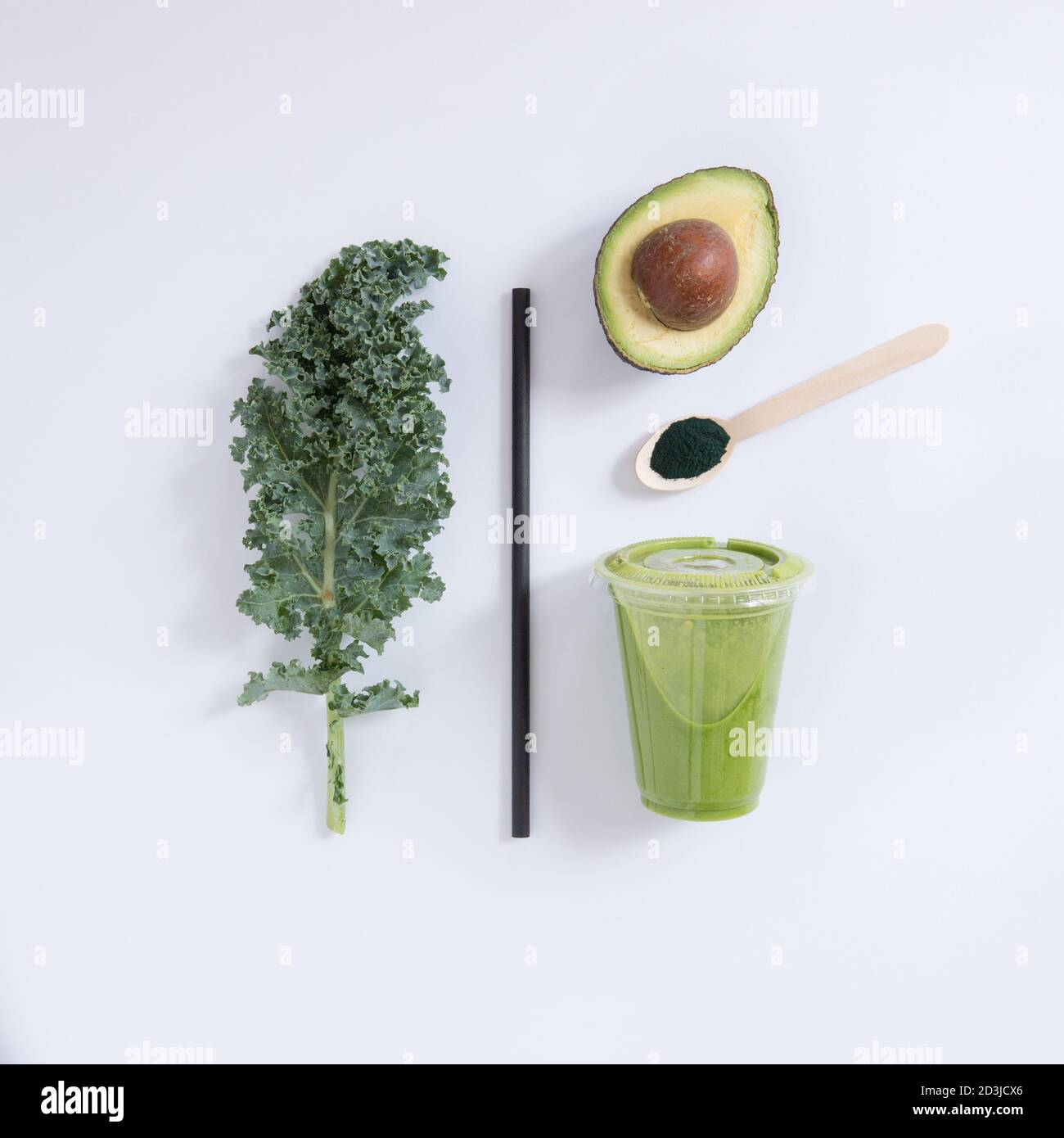 smoothie  concept, fresh Kale health food in plastic glass take away, healthy breakfast, color composition above view, still life. Stock Photo