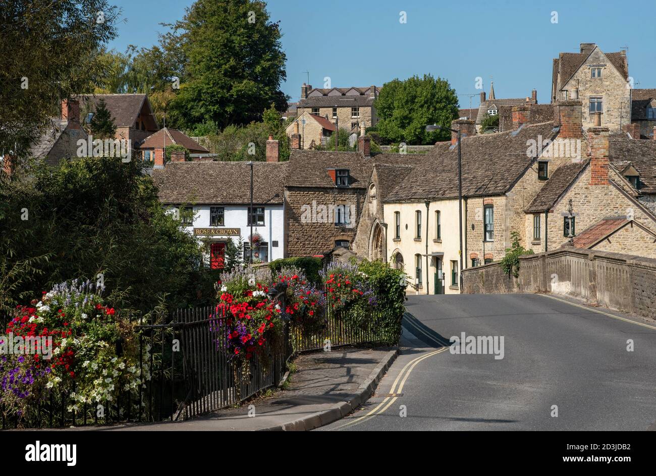 Malmesbury, Wiltshire, England, UK. 2020.  Floral decoration over St Johns bridge in the lower part of this market town. Stock Photo