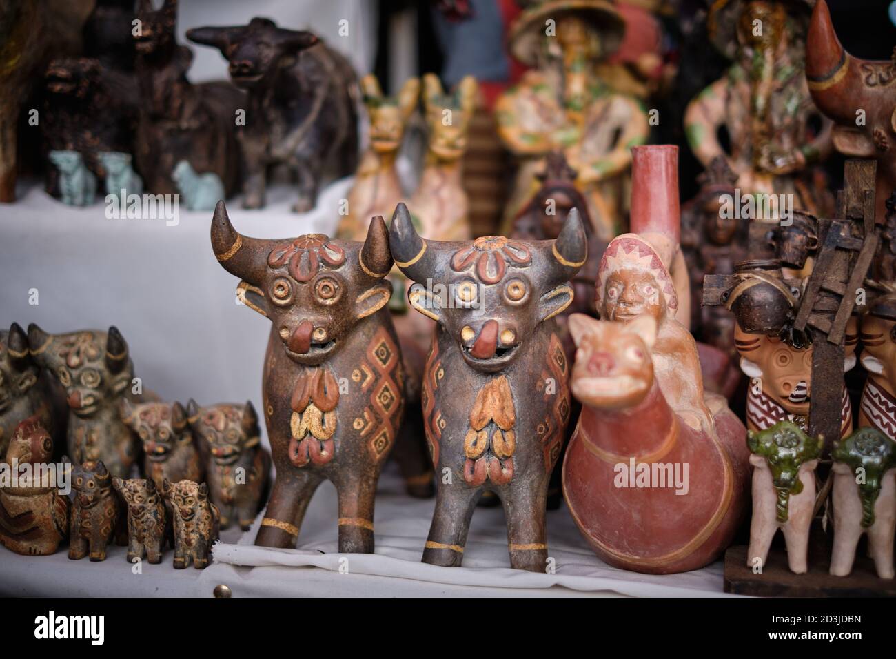 Two model bulls symbolising protection of the home in Incan or Peruvian symbolism Stock Photo