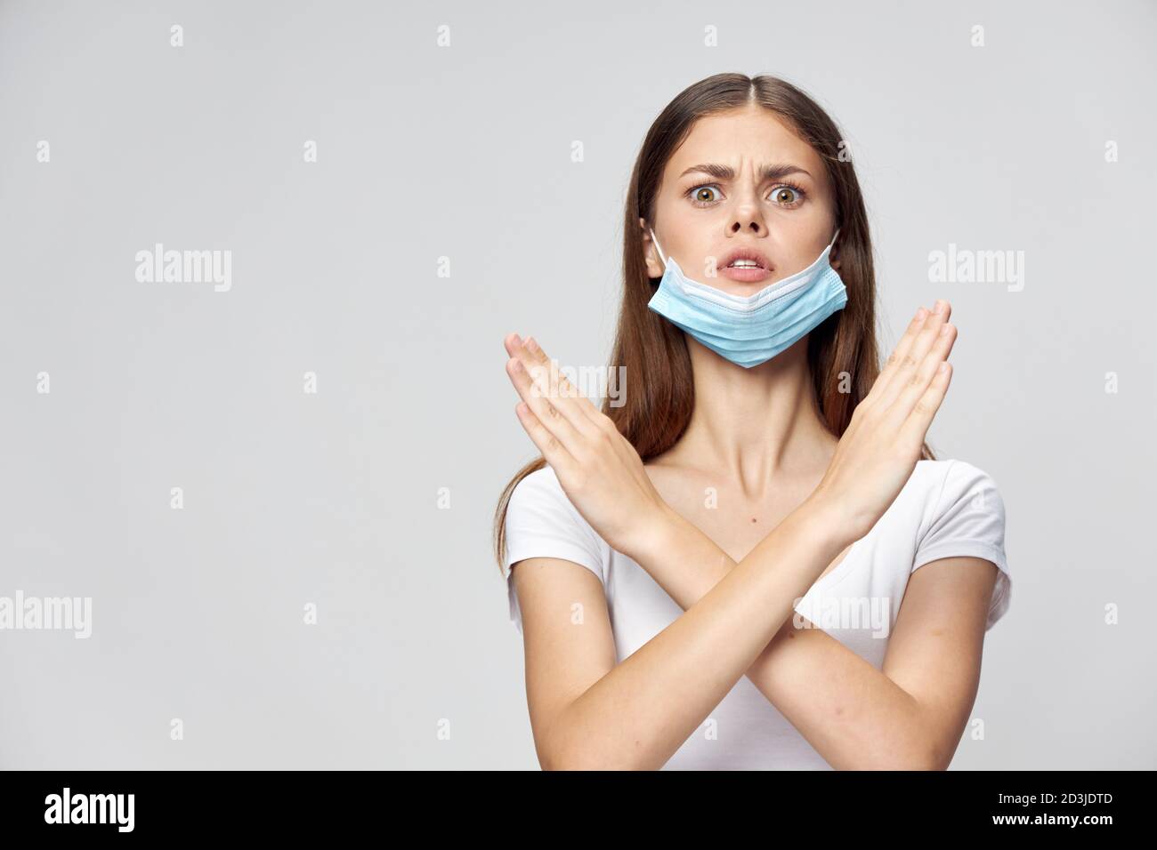 Woman medical mask emotions crossed her arms in front of herself health ...