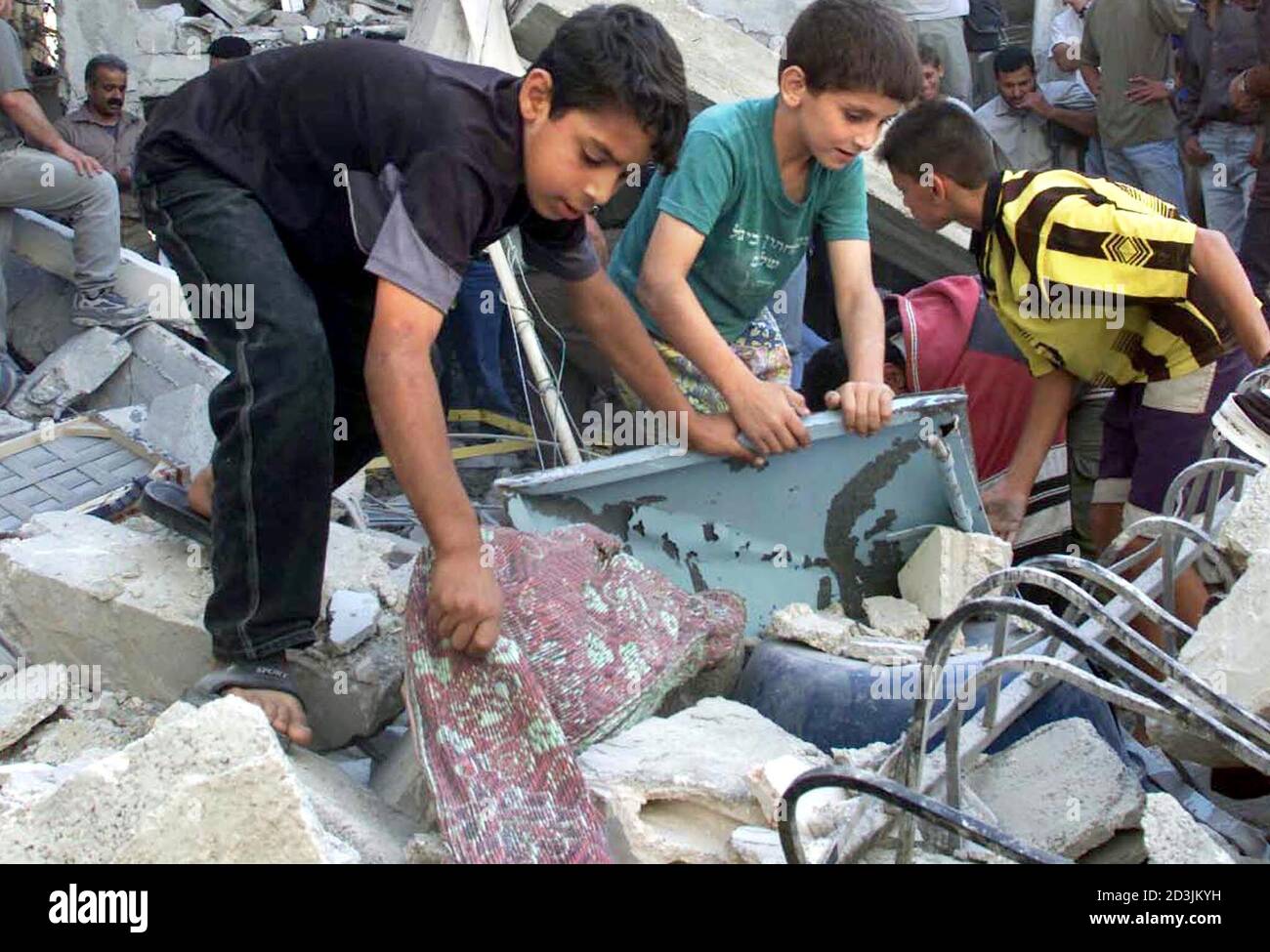 Palestinian Boys Search Through Rubble Of The House Of Shadi Najami A Suicide Bomber Who Carried Out An Attack In Netanya After It Was Demolished By The Israeli Troops In The Alain Palestinian Boys Search Through Rubble Of The House Of Shadi Najami A Suicide Bomber Who Carried Out An Attack In Netanya After It Was Demolished By The Israeli Troops In The Alain