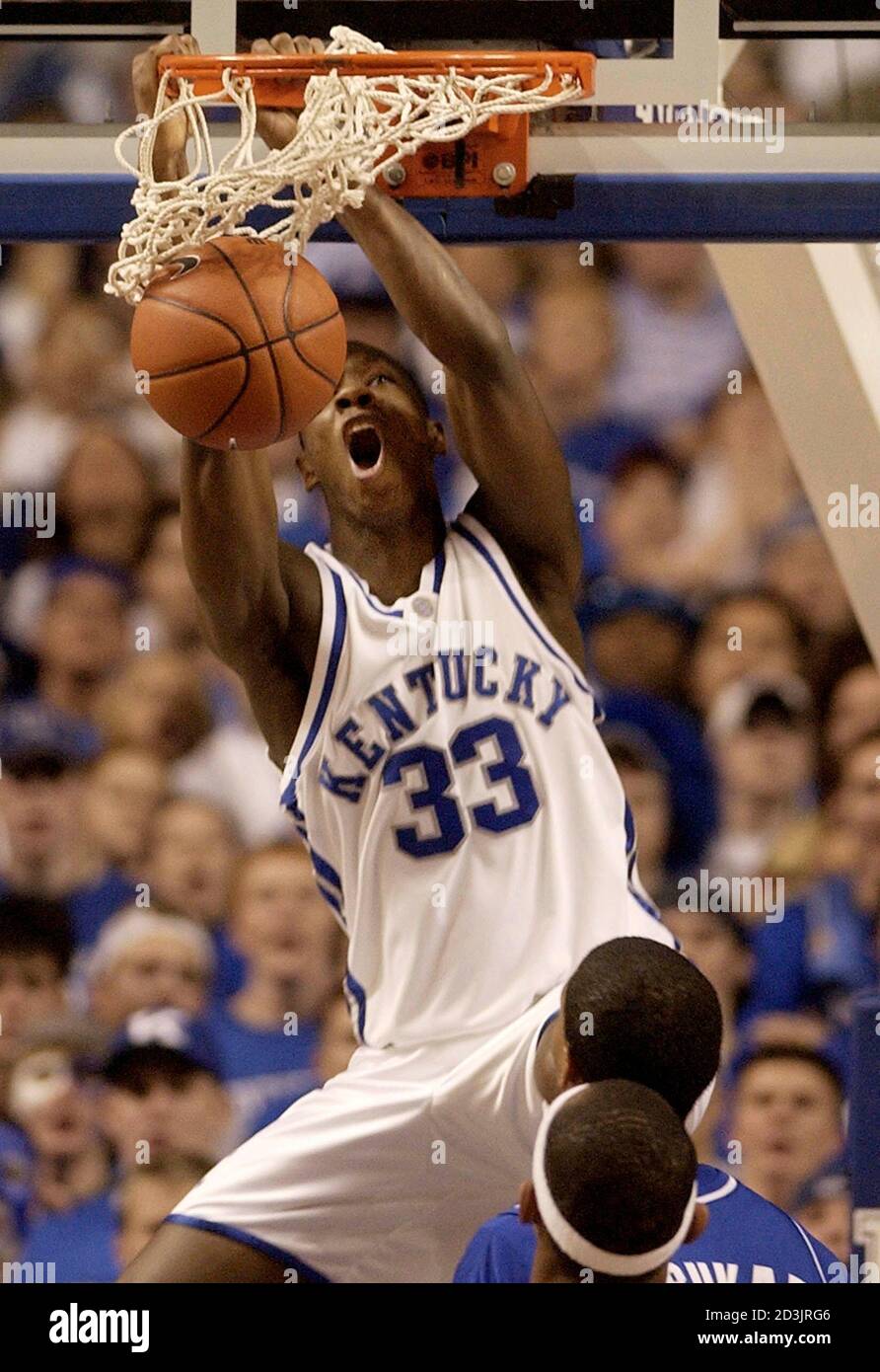 University of Kentucky's Antwain Barbour dunks against the University of  Florida defense during the second half of play at Rupp Arena in Lexington,  Kentucky, March 7, 2004. Kentucky won the game, 82-62.