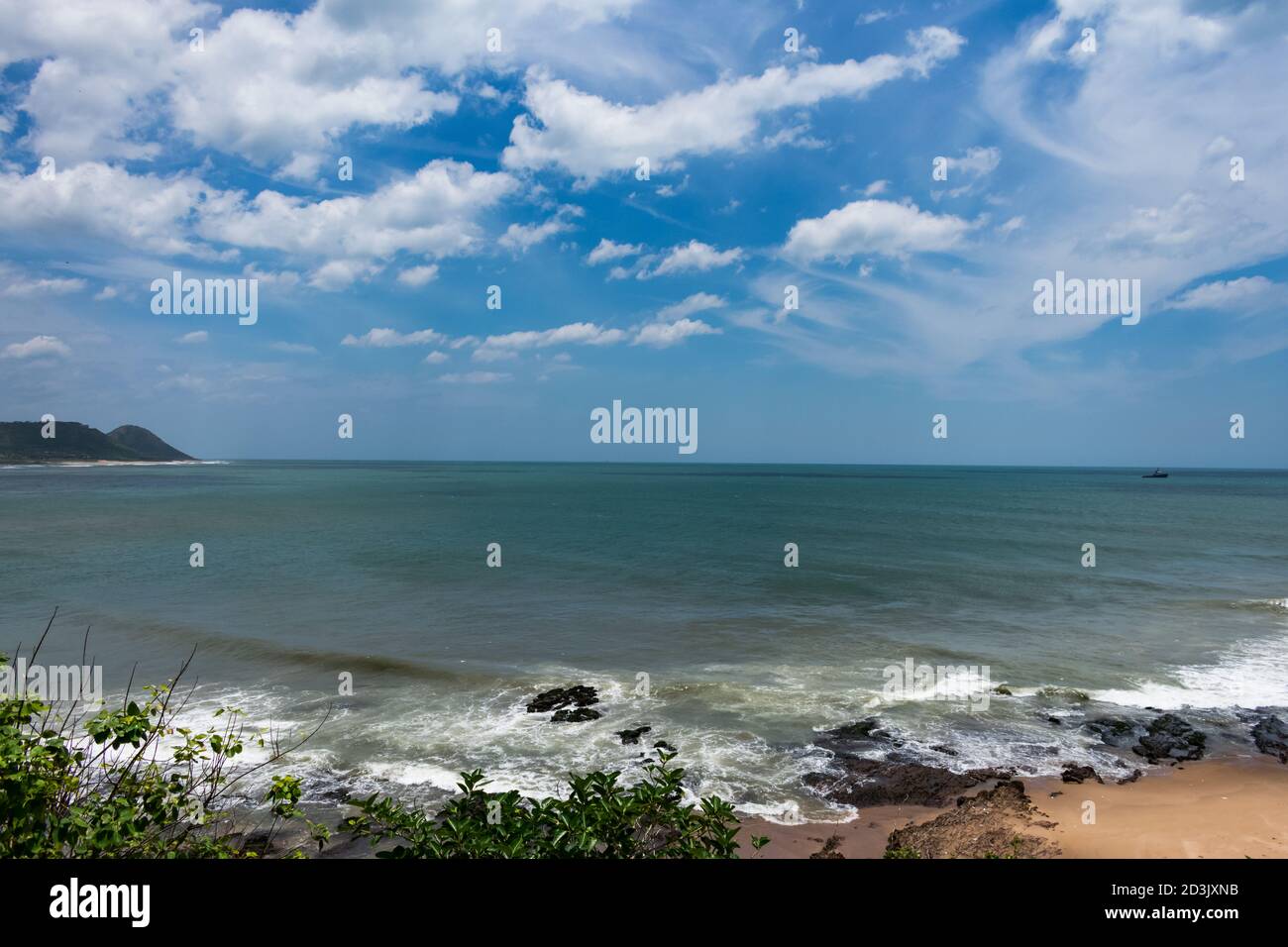 Sea tide awesome view with blue sky on a beautiful beach Stock Photo ...