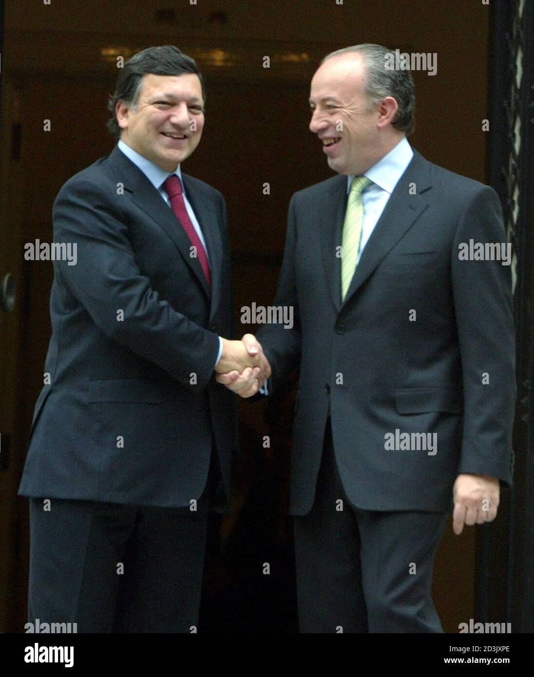 Portuguese Primer Minister Pedro Santana Lopes R Welcomes European Commission President Durao Barroso L Before Their