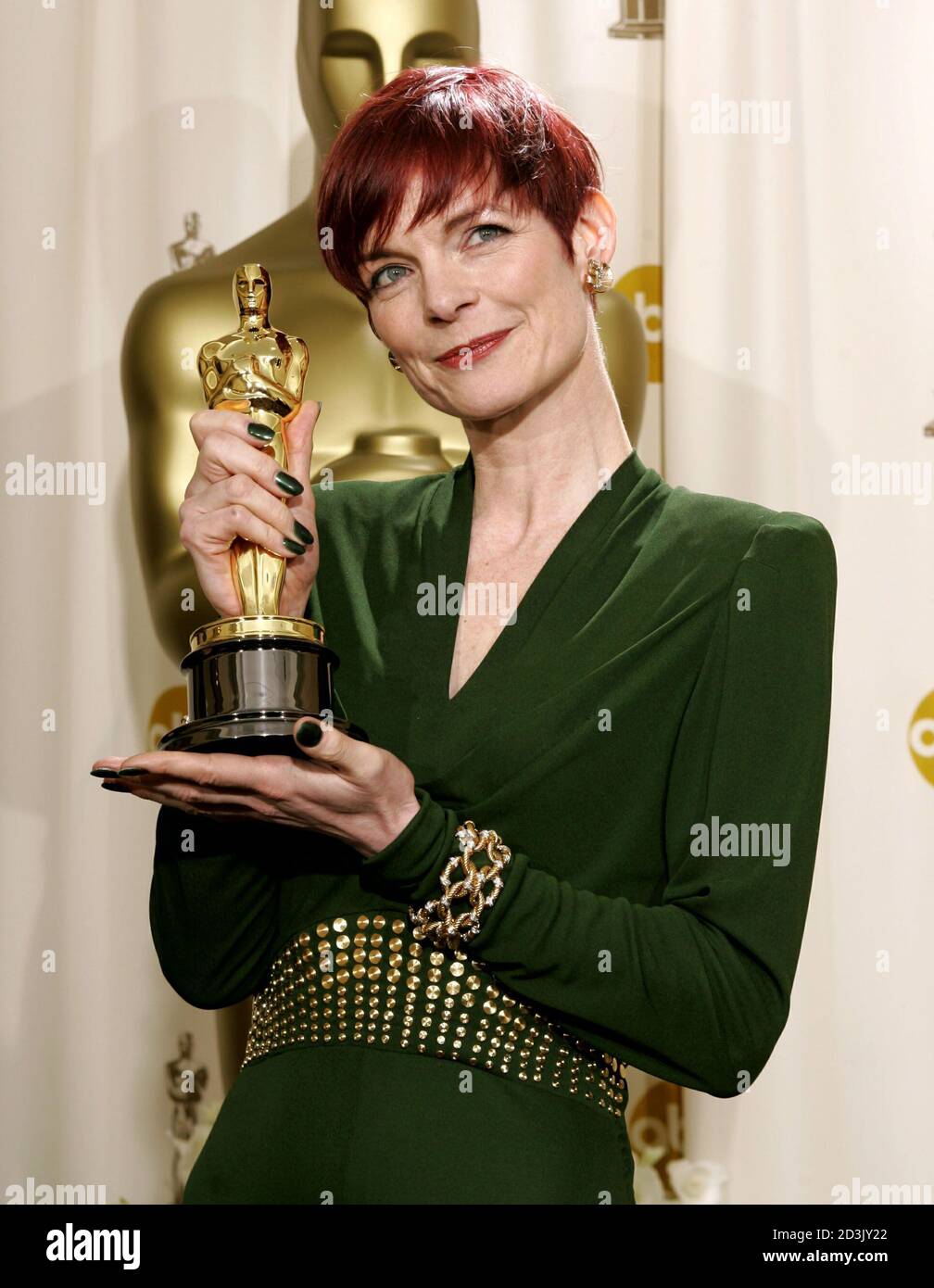 Costume Designer Sandy Powell Poses With Her Oscar Statue At The 77th Annual Academy Awards In Hollywood February 27 05 Powell Won The Academy Award For Best Costume Design For Her Work