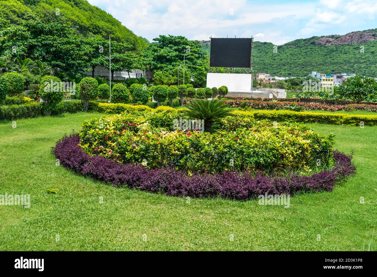 Colorful trees at center of a park looking awesome in circular shape. Stock Photo