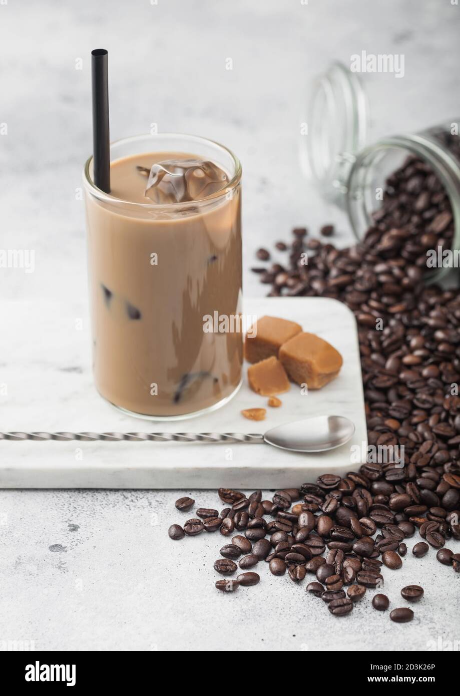 A Glass Jar Of Iced Coffee On The Table Stock Photo, Picture and