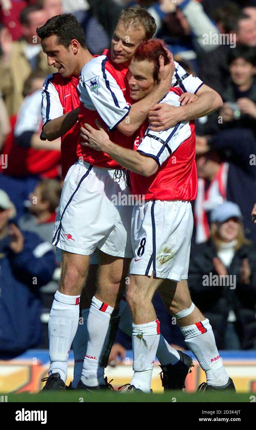 Arsenal Dennis Bergkamp C Hugs Goal Scorer Frederik Ljungberg R After He Scored Against Tottenham Hotspur In The English Premier League Match At Highbury London April 6 02 Reuters Jeff J Mitchell No Internet Online