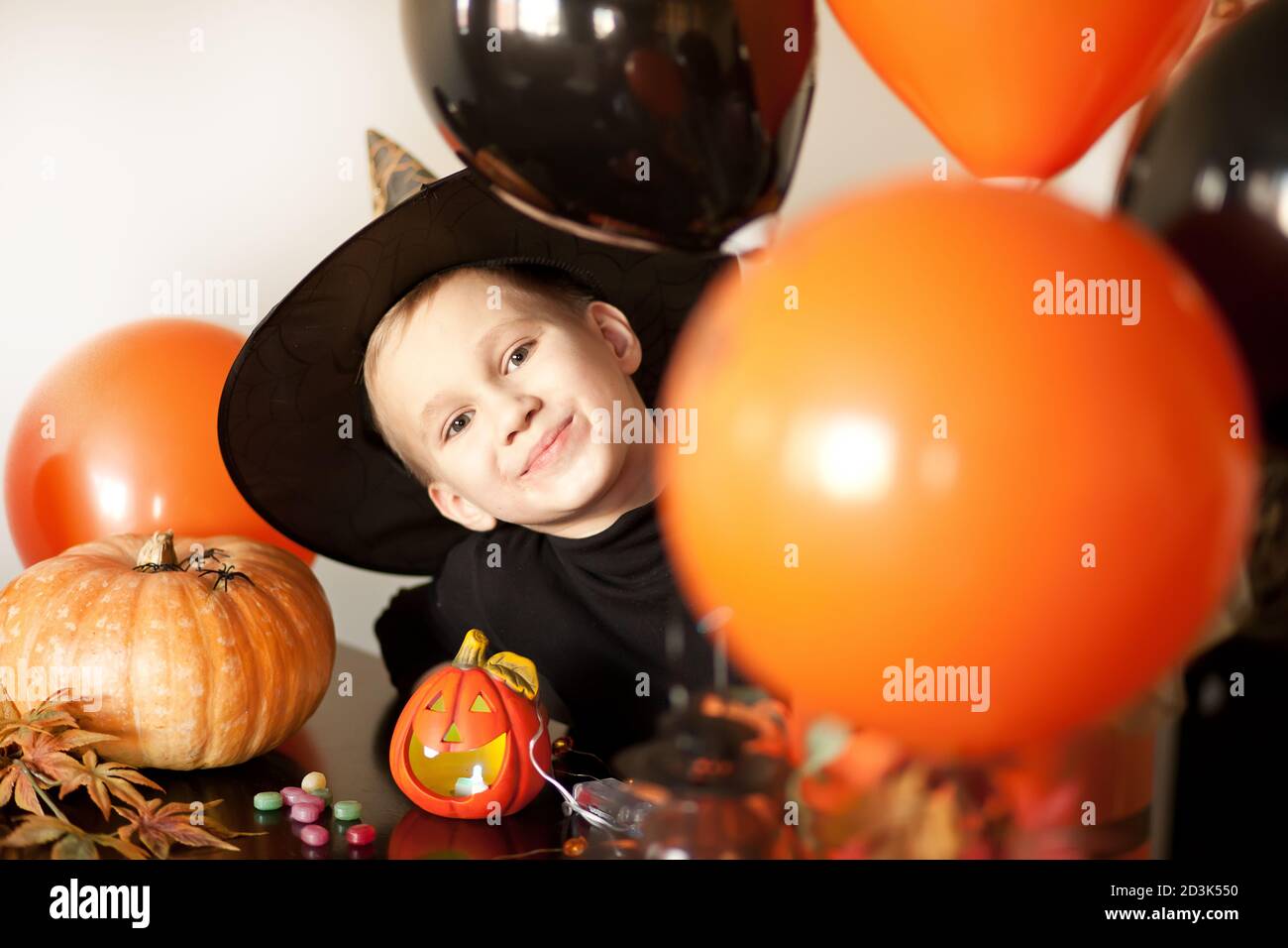 funny boy kid in witch and evil costume for Halloween have fun. Stock Photo