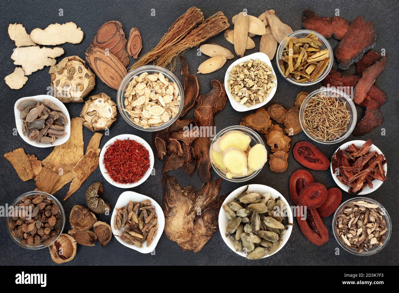 Large Chinese herb collection used in traditional & holistic herbal medicine. Natural health care concept. Flat lay, top view. Stock Photo