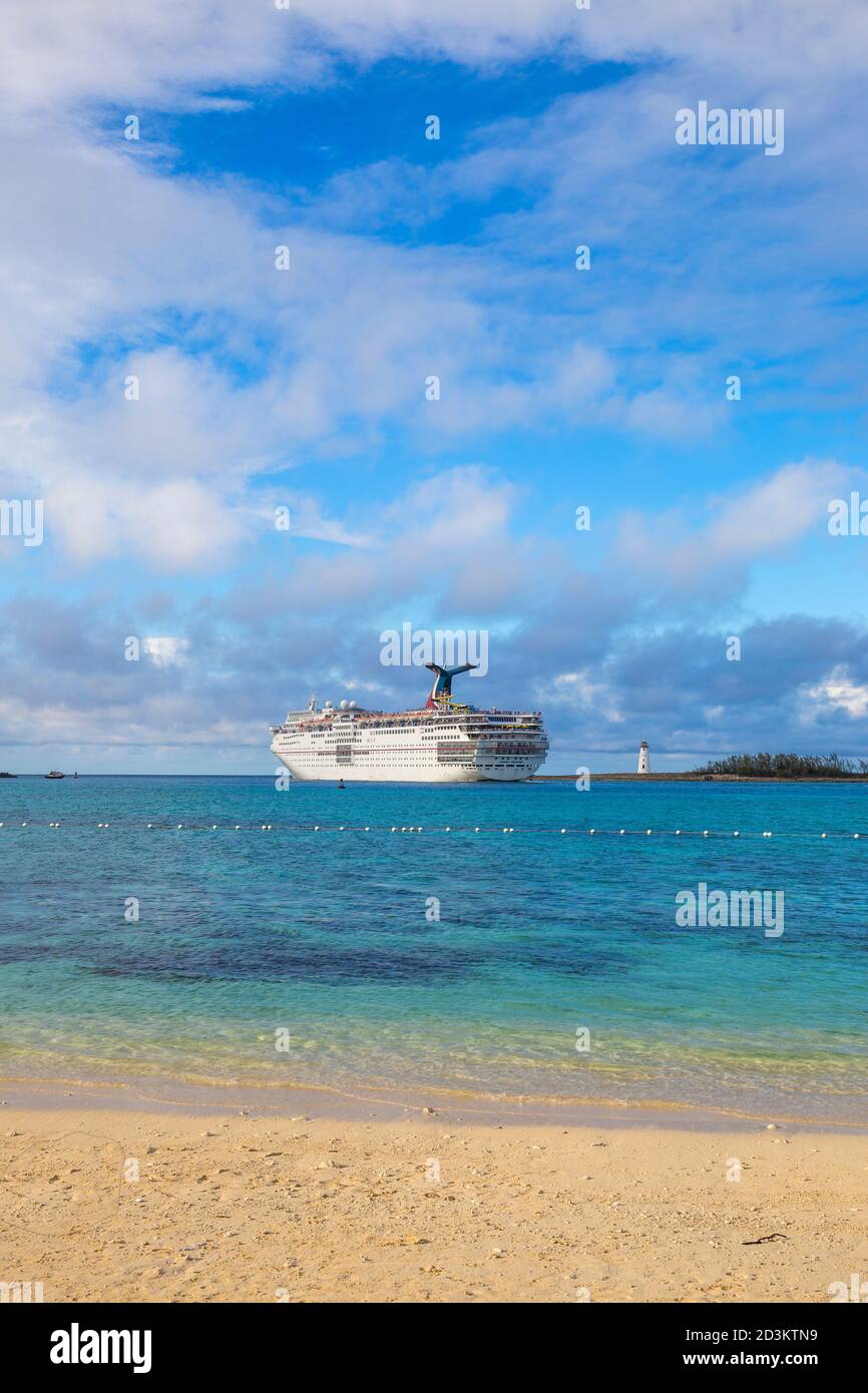 Caribbean, Bahamas, Providence Island, Nassau, Junkanoo beach with cruise ship in distance Stock Photo