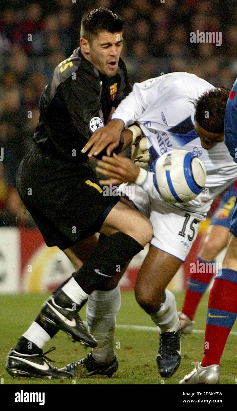 Barcelona S Goalkeeper Valdes Collides With Chelsea S Drogba During Their Champions League First Knock Out Round First Leg Match In Barcelona Barcelona S Goalkeeper Victor Valdes L Collides With Chelsea S Didier Drogba During Their Champions Barcelona S Goalkeeper Valdes Collides With Chelsea S Drogba During Their Champions League First Knock Out Round First Leg Match In Barcelona Barcelona S Goalkeeper Victor Valdes L Collides With Chelsea S Didier Drogba During Their Champions
