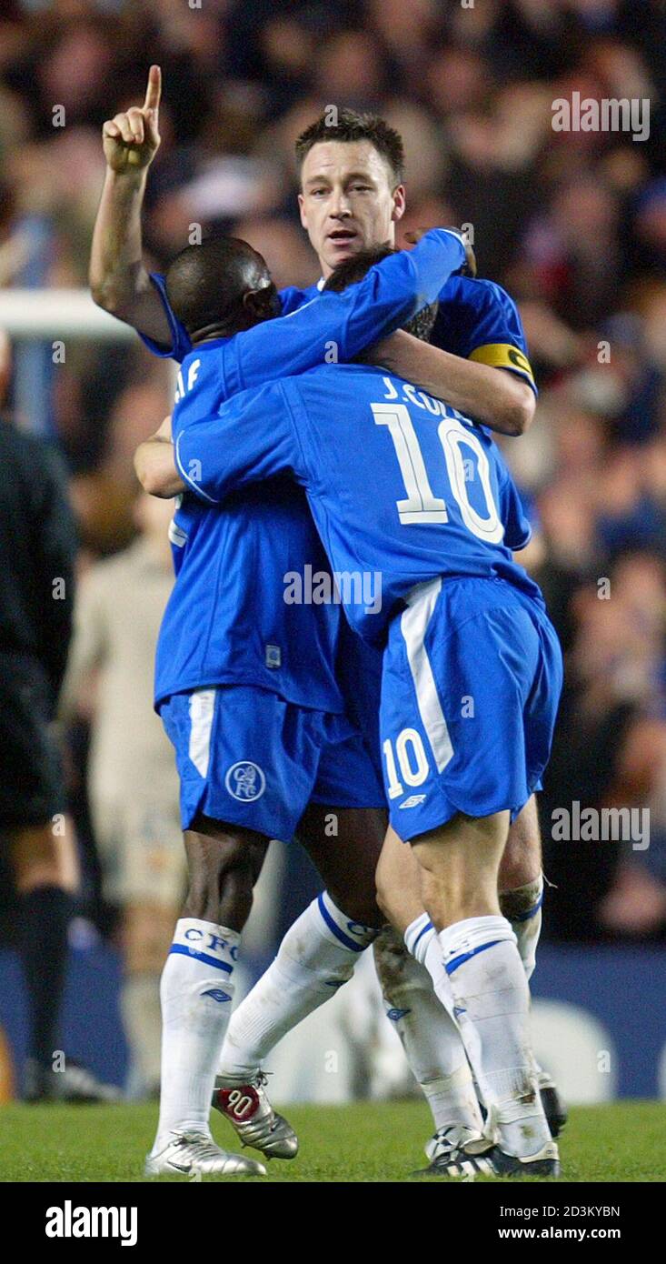 Chelsea S John Terry Celebrates Scoring With Joe Cole R And Claude Makelele L Against Barcelona During Their Champions League First Knockout Round Second Leg Match At Stamford Bridge London March 8 05 Reuters Mike