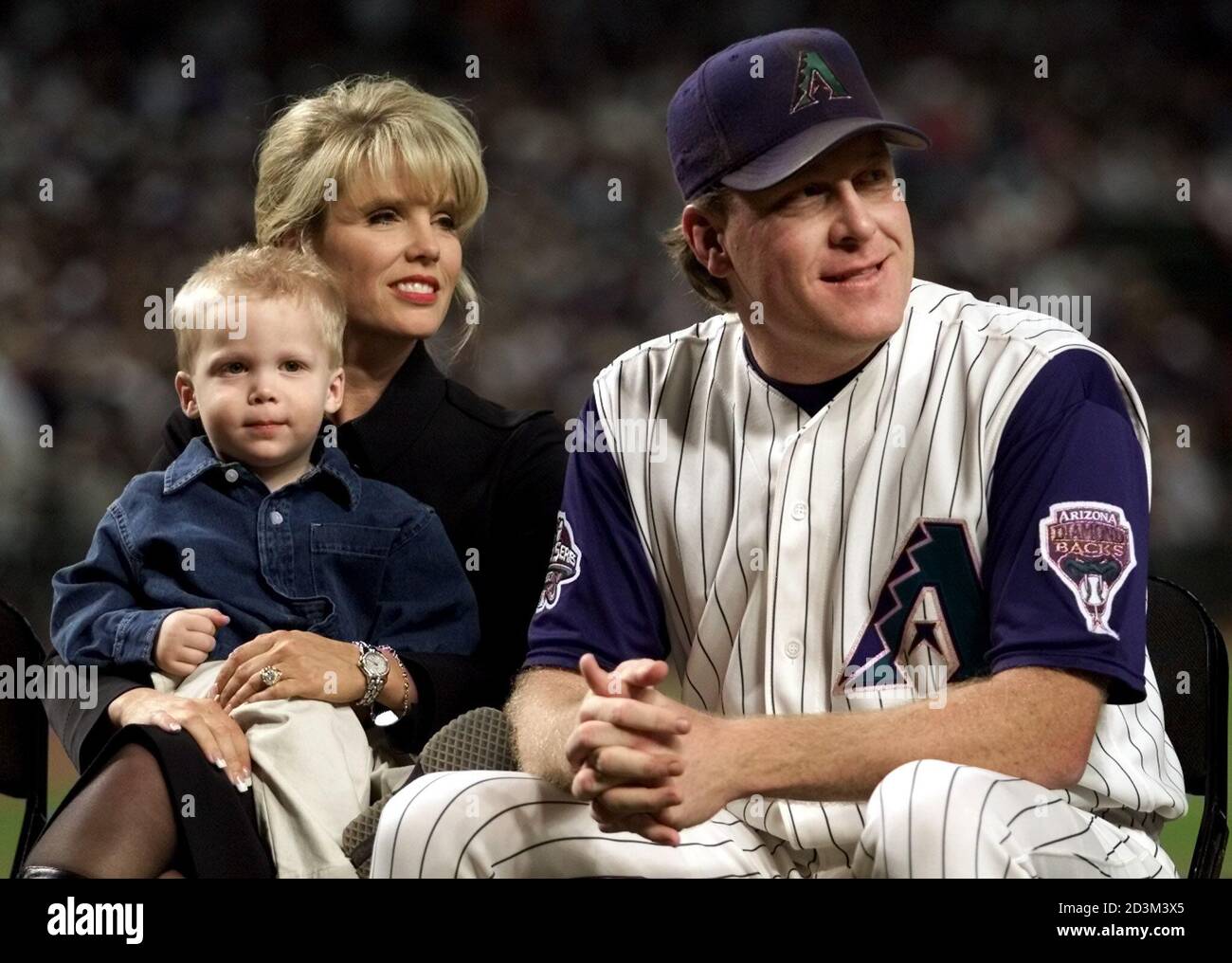 Arizona Diamondbacks Pitcher Curt Schilling Sits With His Wife Shondra And Son Grant During Pre Game Ceremonies Before Game 2 Of The 01 World Series At Bank One Ballpark In Phoenix October 28