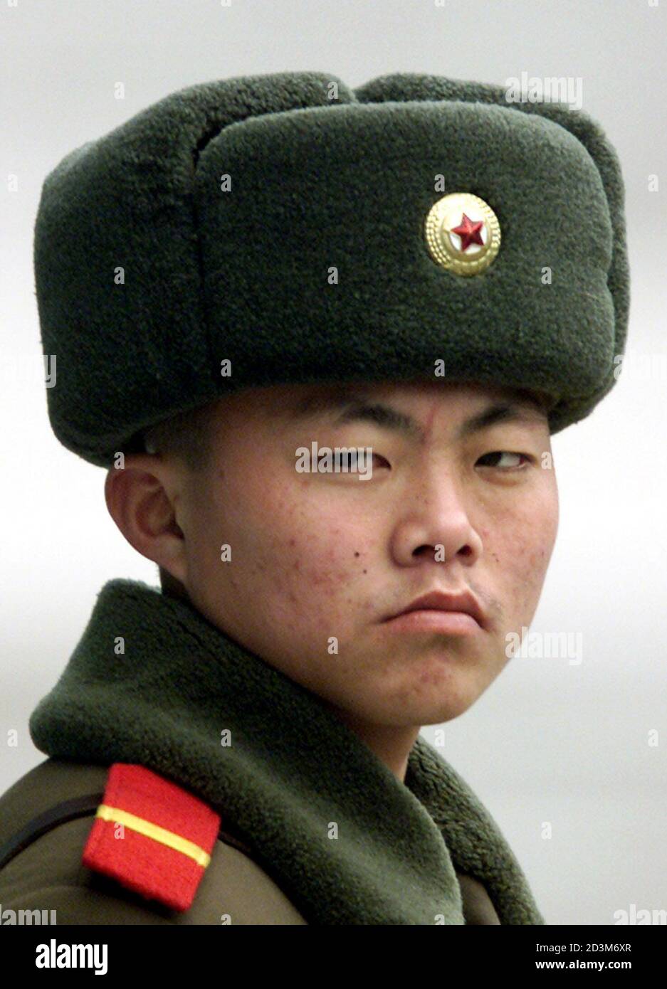 A North Korean soldier looks at the 