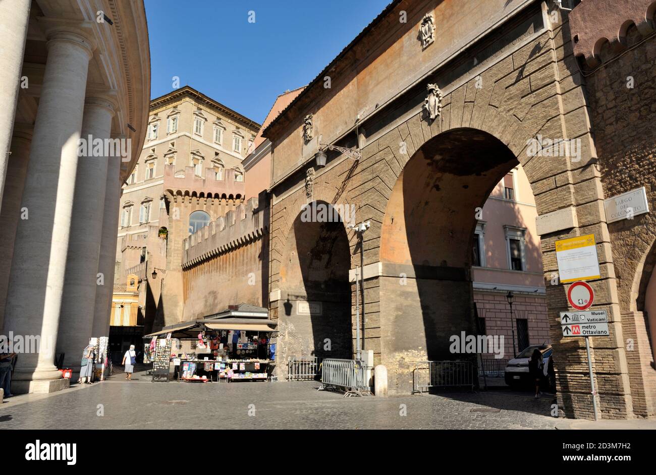 Italy, Rome, Largo del Colonnato, colonnade and Vatican walls gate Stock Photo