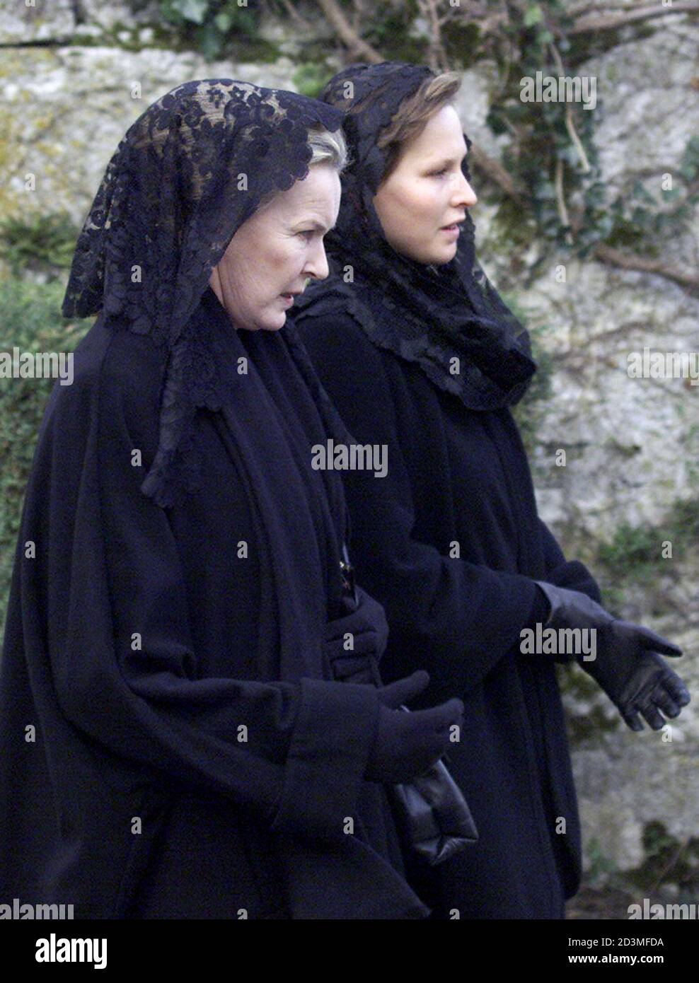 Maria Gabriella of Savoy (L), a daughter of Italy's last queen Maria Jose who died at 94 last weekend in Geneva, arrives with her daughter for funeral services at the Hautecombe Abbey, February 2, 2001. Maria Jose, Italy's last queen, who with her[ husband Umberto II], ruled for only 27 days before a referendum introduced the Italian republic on June 2, 1946. [Maria Jose was born in 1906 at Ostend, Princess Maria Jose Charlotte Henrietta Gabriella of Saxony-Coburg, the daughter of King Albert and Queen Elizabeth of the Belgians.       ] Stock Photo