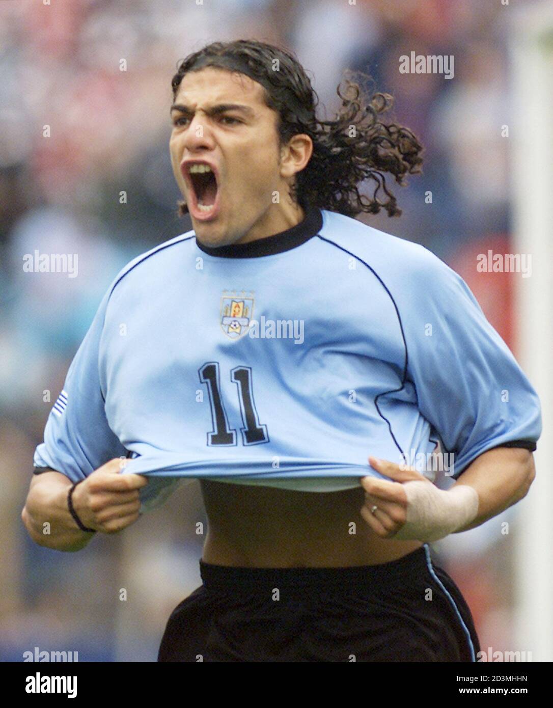 Federico Magallanes of Uruguay celebrates after scoring his team's first  goal against Colombia in the first half of their World Cup qualifying match  played at Centenario stadium in Montevideo, October 7, 2001.