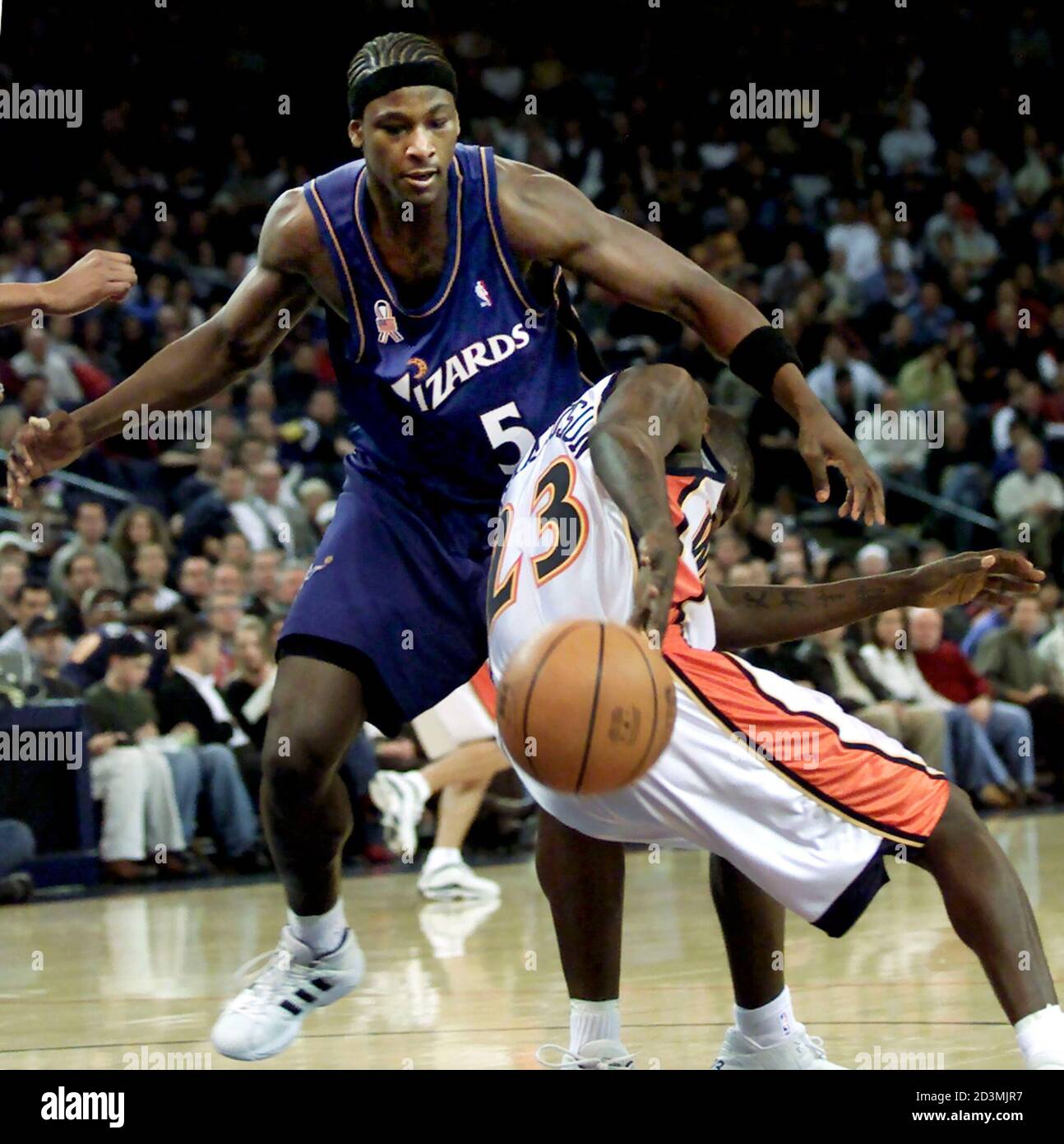 Golden State Warriors Guard Jason Richardson 23 Loses The Ball Under Pressure From Washington Wizards Center Kwame Brown 5 During First Quarter Nba Action At The Arena In Oakland California On March