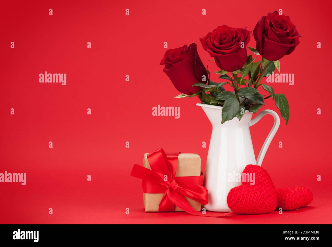 Valentines day greeting card with rose flower bouquet and gift box in ...