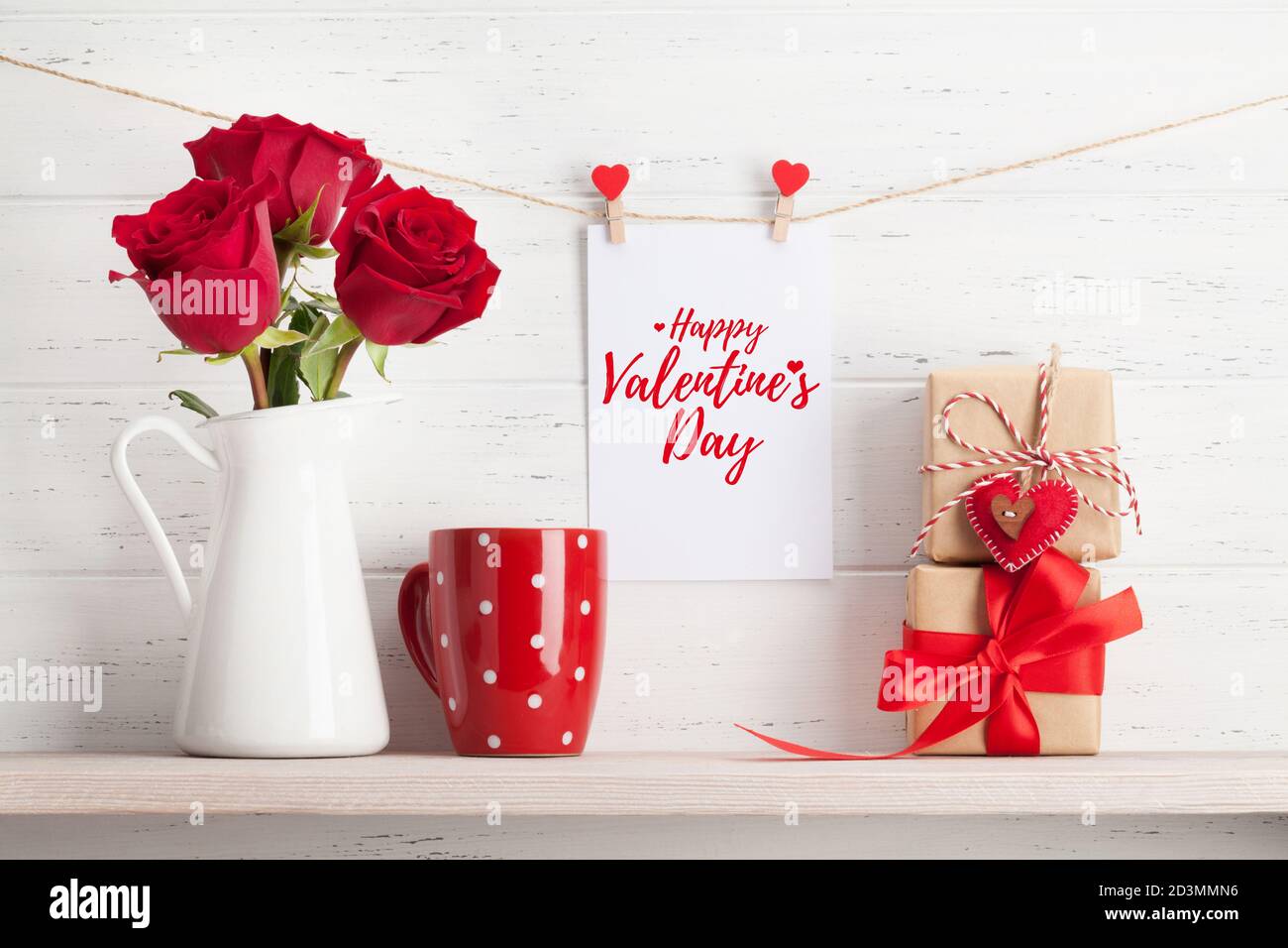 Valentines day greeting card with rose flowers and gift boxes on white ...