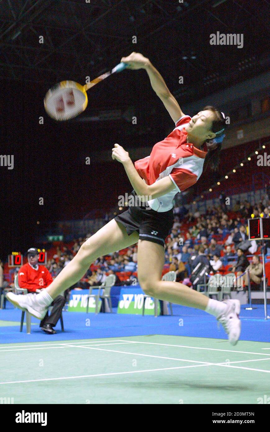 World number two Zhang Ning of China smashes a return to England's Julia  Mann during their second round match in the Women's Singles competition at  the All England Open Badminton Championships in