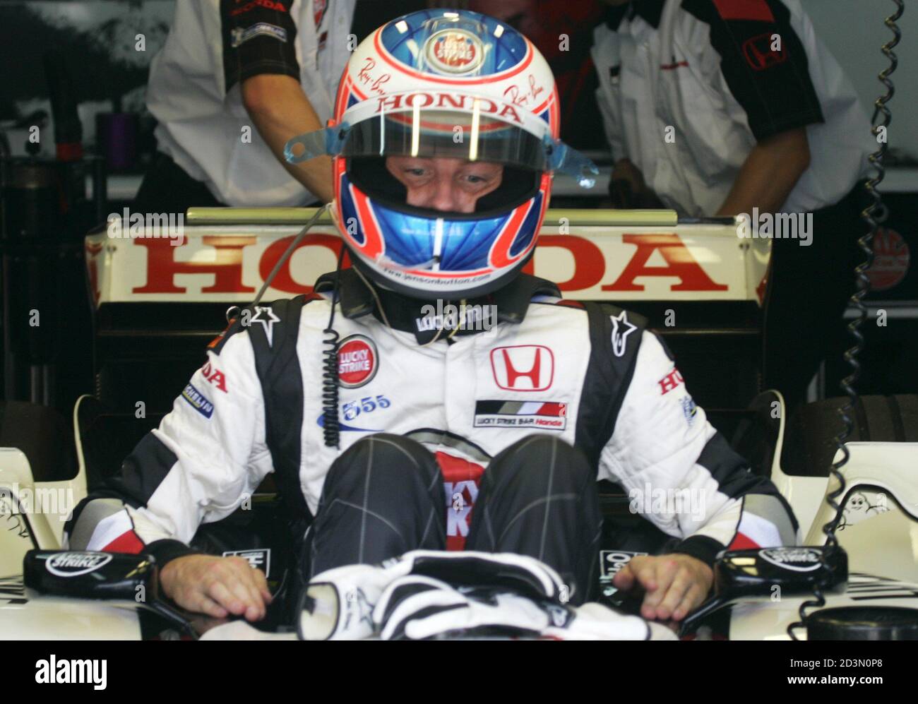 Bar Formula One Driver Jenson Button Of Britain Gets Out Of His Car Following The First Practice Session For The Bahrain Grand Prix At The Bahrain International Circuit In Sakhir South Of
