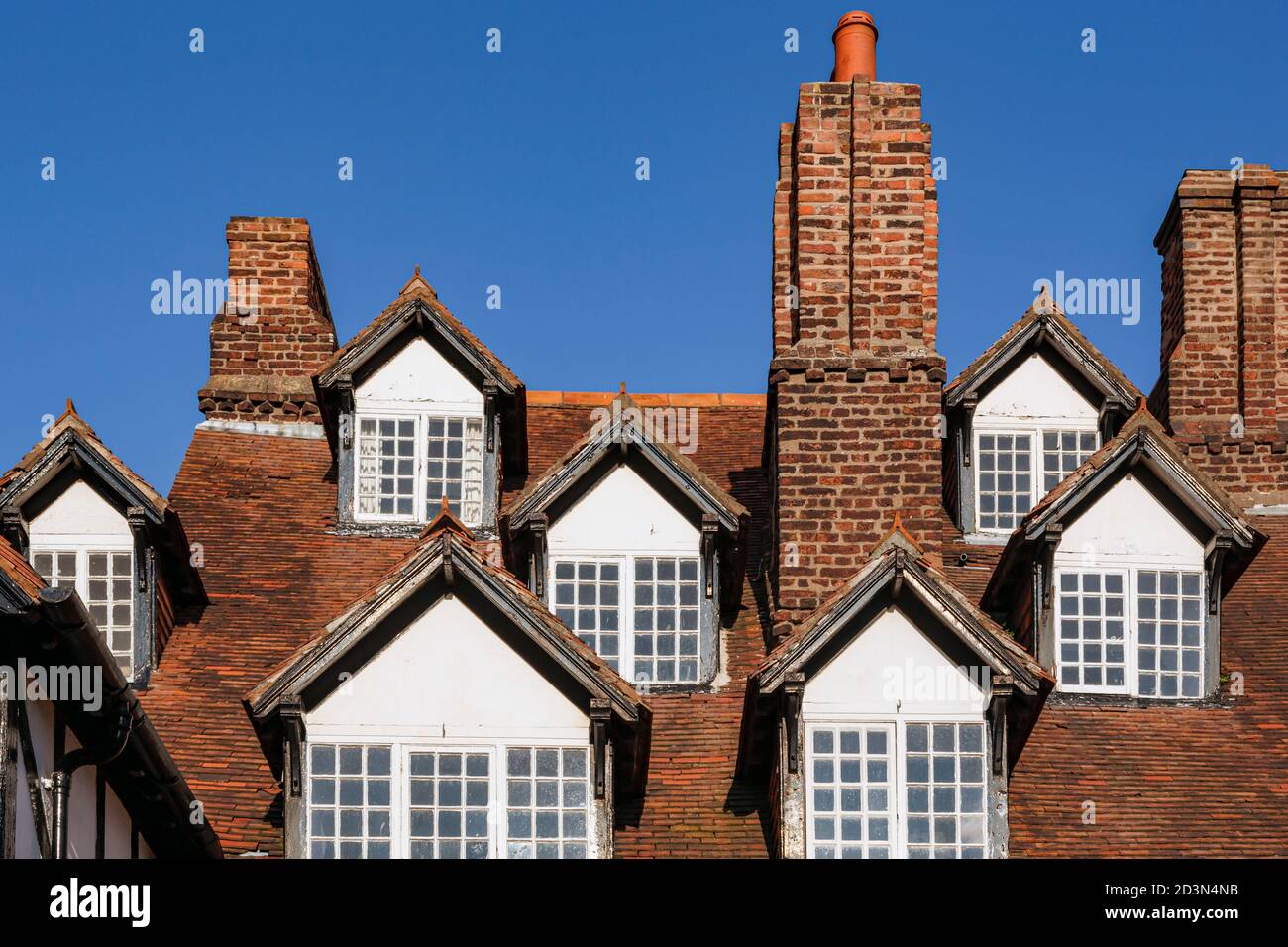 Ruthin, Denbighshire, Wales, United Kingdom.  Windows in the Dutch style building housing the Myddleton Arms, which was built in the mid 16th century. Stock Photo