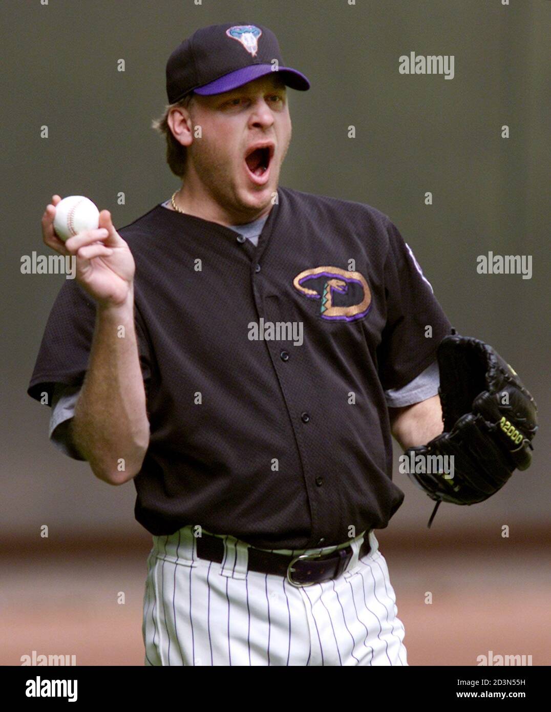 Arizona Diamondbacks Pitcher Curt Schilling Yawns While Taking Part In The Team S Workout At The Bank One Ballpark In Phoenix October 26 01 Schilling Will Start Game 1 Of The World Series