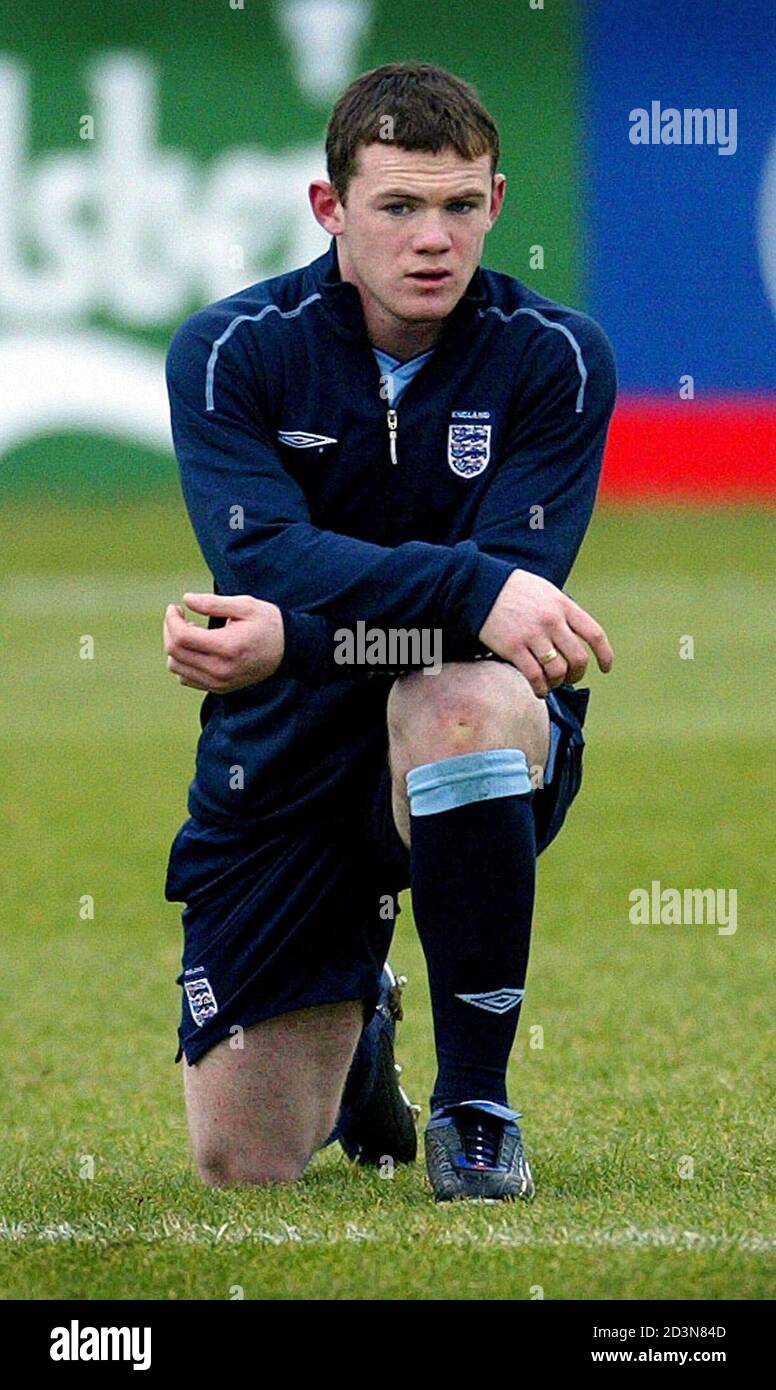 Everton's Wayne Rooney warms up during an England training session at the  Charlton Athletic training ground in London, February 10, 2003. England are  due to play a friendly match against Australia at