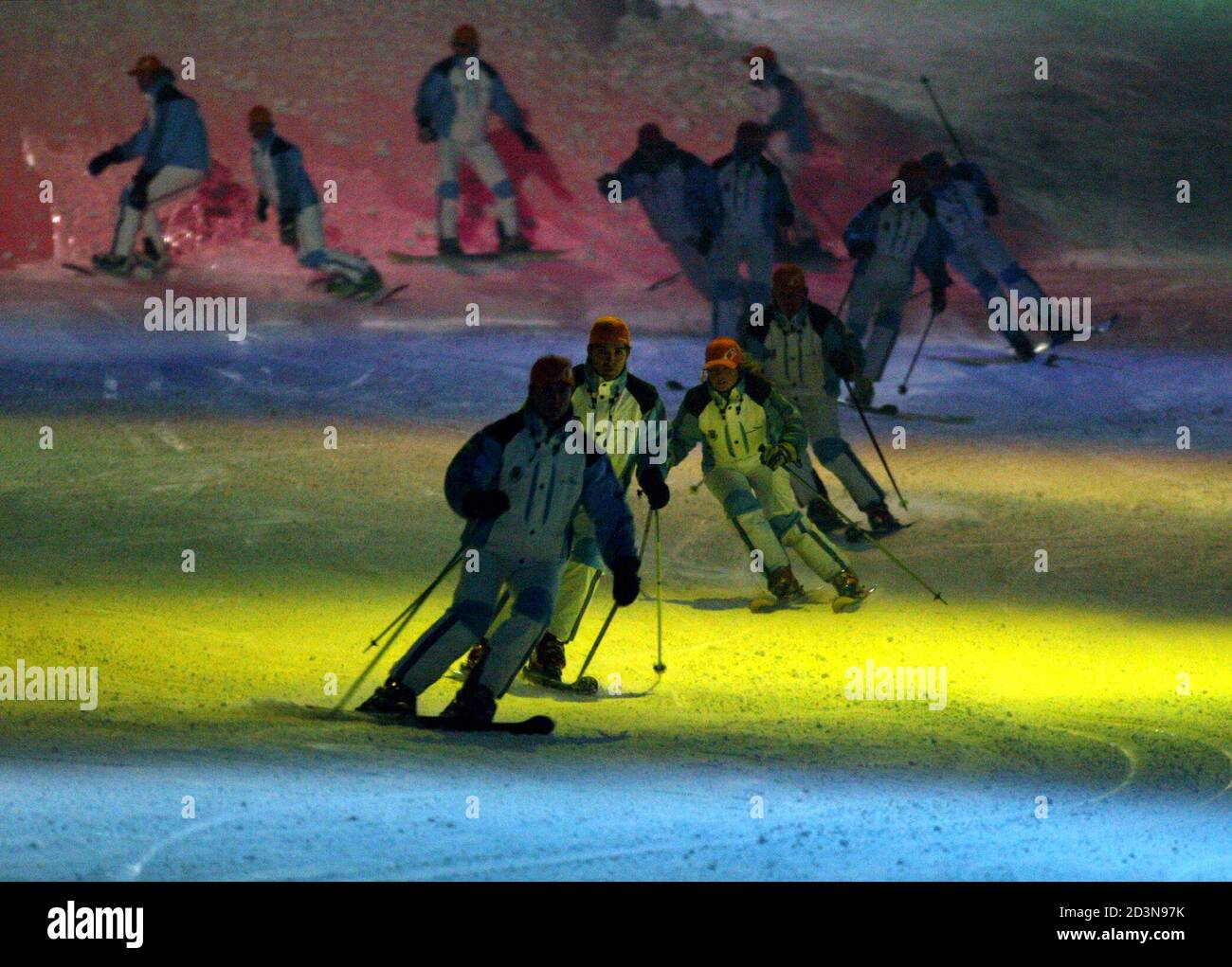 Skiers descend the slope during the opening of Europe's largest indoor ski  centre inside a vast entertainment and retail complex constructed by U.S.  developer Mills Corporation in Arroyomolinos, outside Madrid May 16,