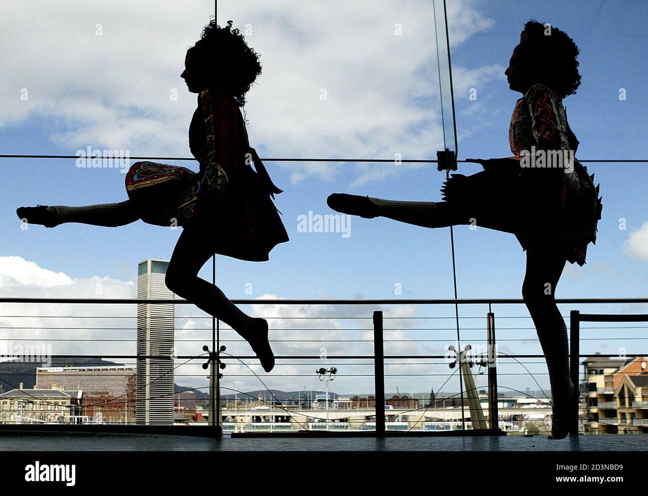 Dancers from the U.S. and Canada perform during a break in the under-16 group dancing section, during the World Irish Dancing Championships in Belfast, April 7, 2004. REUTERS/Paul McErlane  PM/DBP Stock Photo