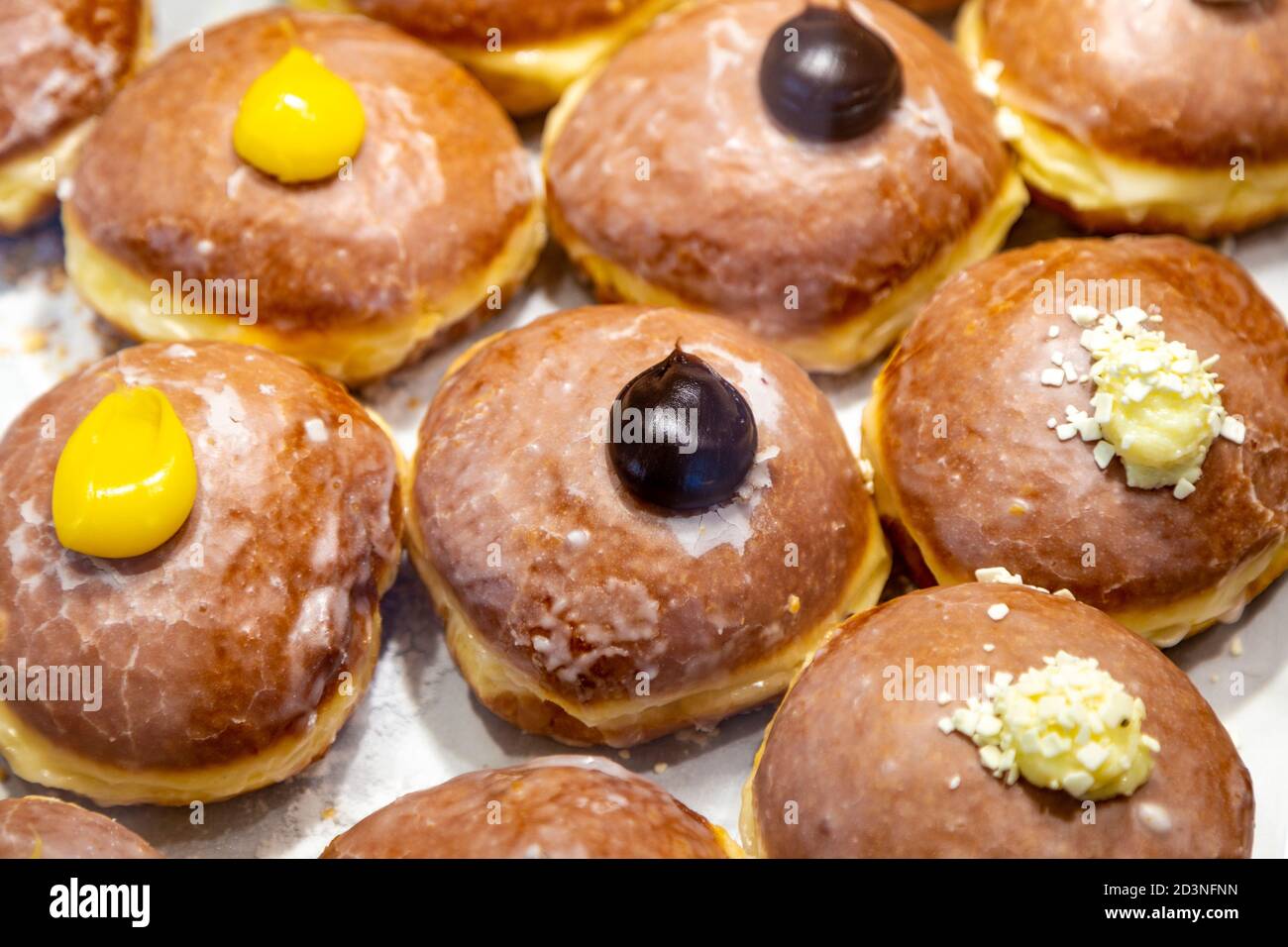 Selection of doughnuts at Pączkarnia z Tradycją M. M. Wolińscy doughnut and bakery shop, Warsaw, Poland Stock Photo