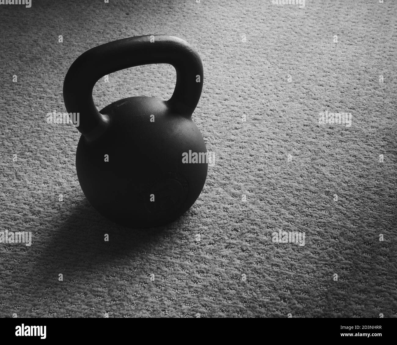 Minimal image of a classic kettlebell weight Stock Photo