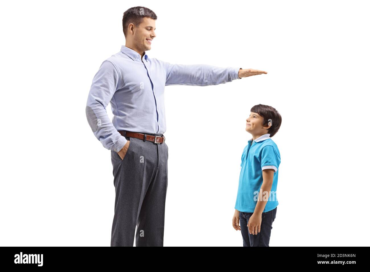 Man measuring the height of a boy isolated on white background Stock Photo