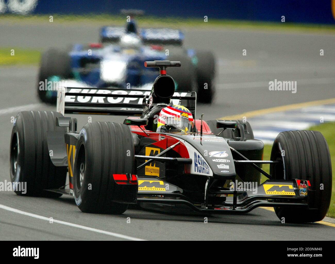 Minardi Team Driver Alex Yoong From Malaysia Drives During The Qualifying Session In Melbourne March 2 2002 Yoong Qualified 21st For Sunday S Australian Formula One Grand Prix Rubens Barrichello From Brazil Qualified
