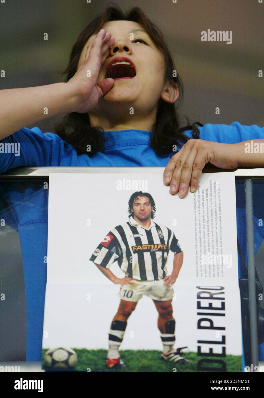A Japanese Fan Shouts To Italy S Players As She Holds A Picture Of Italy S Alessandro Del Piero During The Warm Up Match Against Vegalta Sendai At Sendai S Stadium May 30 02 Italy Won