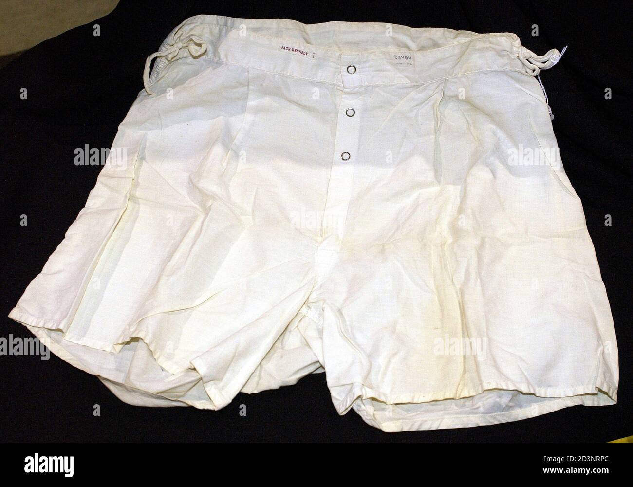 Boxer shorts belonging to late President John F. Kennedy on display as part of the items for auction belonging to the late president and first lady Jacqueline Kennedy on July 18, 2003. The auction, at Dawson's Auctioneers & Appraisers in Morris Plains, New Jersey, will include more than 300 items ranging from the whimsical, [World War IINavy-issue boxer shorts, with the sown label, 'Jack Kennedy', to the historic, a personal presidential campaign notebook.] Stock Photo