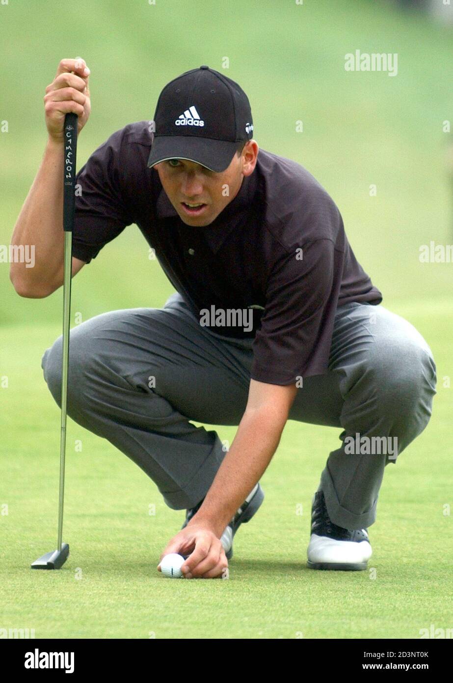 Sergio Garcia of Spain lines up a putt during the second round of the  European Masters golf tournament in Crans-sur-Sierre, Switzerland,  September 5, 2003. Garcias places thirteenth after the second round with