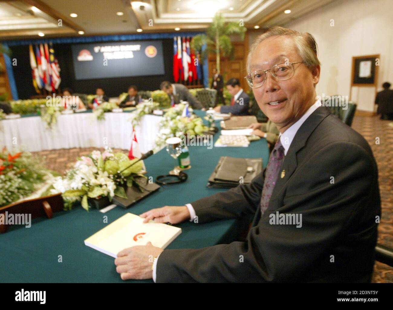 Singapore Prime Minister Goh Chok Tong sits in a conference room for the  opening of a meeting of the ASEAN summit in Nusa Dua on October 7, 2003.  Leaders from the ASEAN (