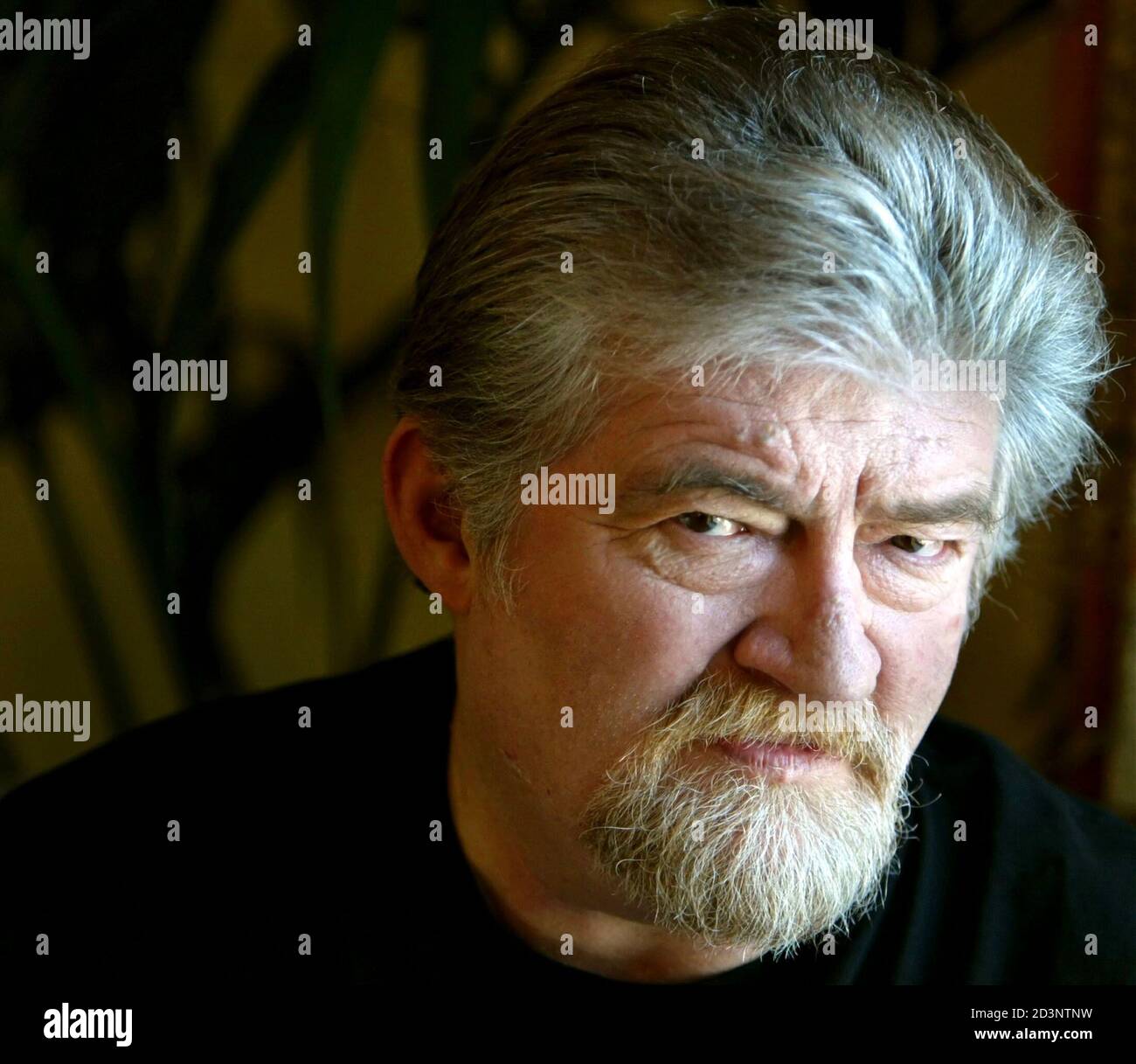 Author Joe Eszterhas is pictured at the Regent Beverly Wilshire hotel in Beverly Hills, California, February 3, 2004. Stock Photo