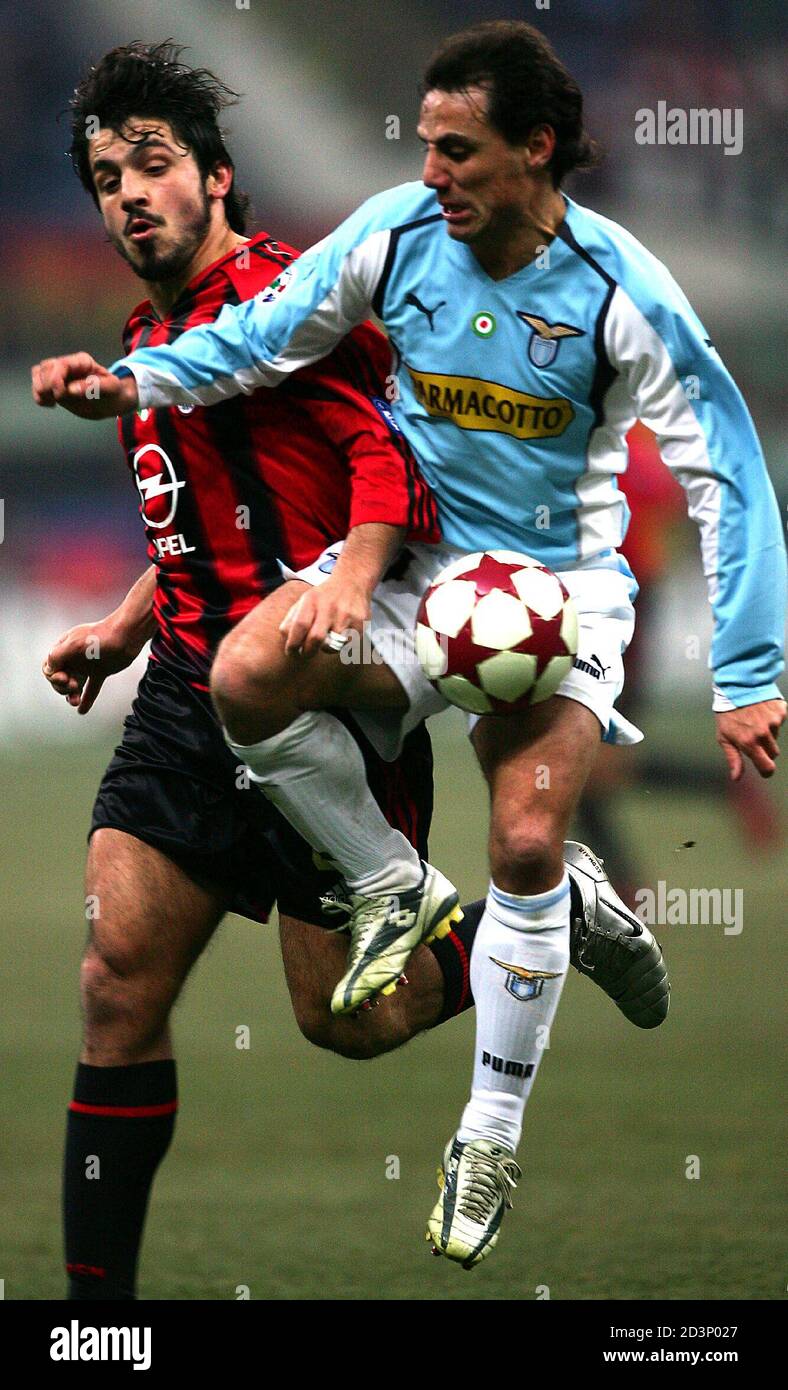 Ac Milan S Gennaro Gattuso L Challenges Antonio Filippini R Of Lazio During Their Serie A Match At The San Siro Stadium In Milan Northern Italy February 6 05 Reuters Daniele La Monaca Dlm Ws