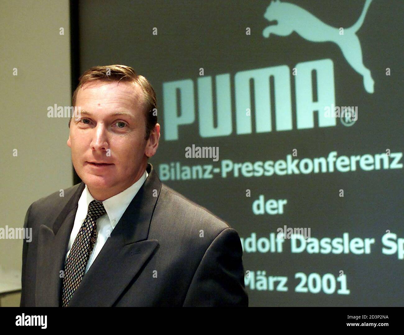 Jochen Zeitz, CEO of Germany's second-largest sportswear group Puma AG pose  for the media prior to the annual news conference in Herzogenaurach, March  9, 2001. The group, number two after Adidas Salomon