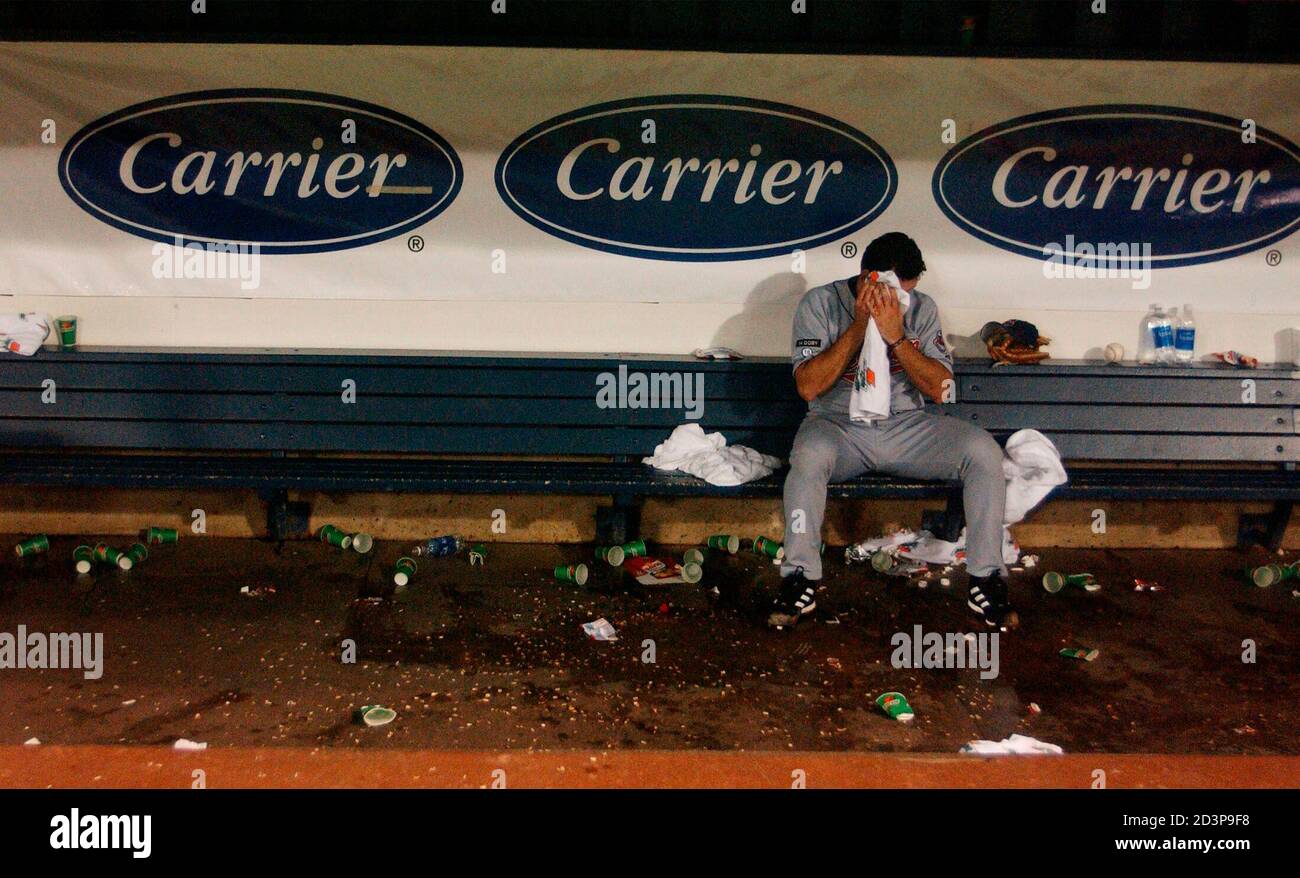 Cleveland Indians Relief Pitcher Rafael Bettancourt Wipes Sweat From His Brow While Sitting Alone In The Dugout After The Indians 3 2 Loss To The Minnesota Twins In Their American League Game In