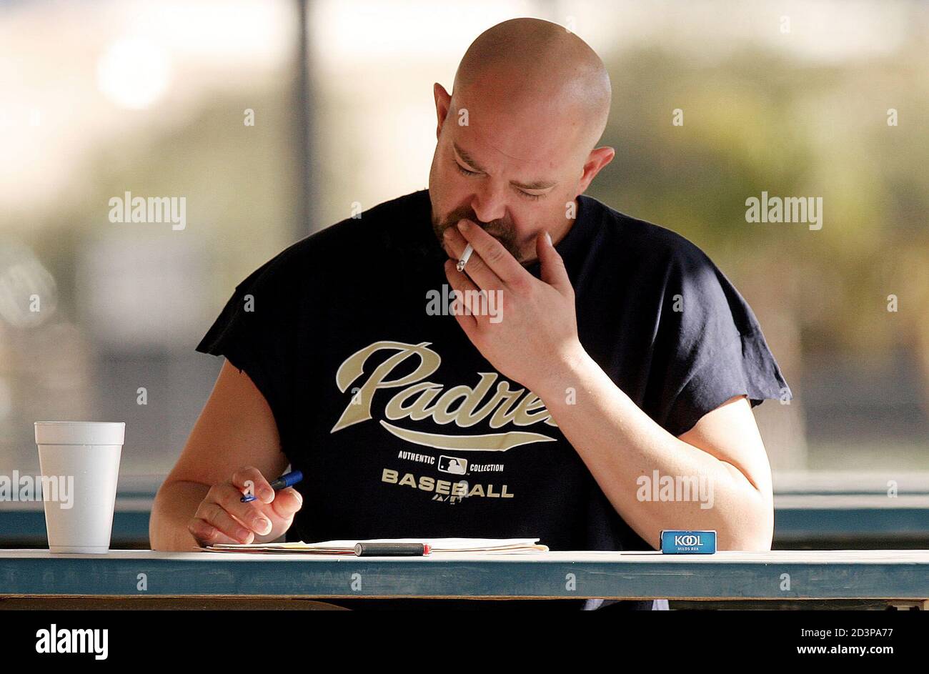 San Diego Padres pitcher Rod Beck fills out an injury history form during the team's physicals for pitchers and catchers, at their spring training facility in Peoria, Arizona February 21, 2004. REUTERS/Jeff Topping  JT/GN Stock Photo