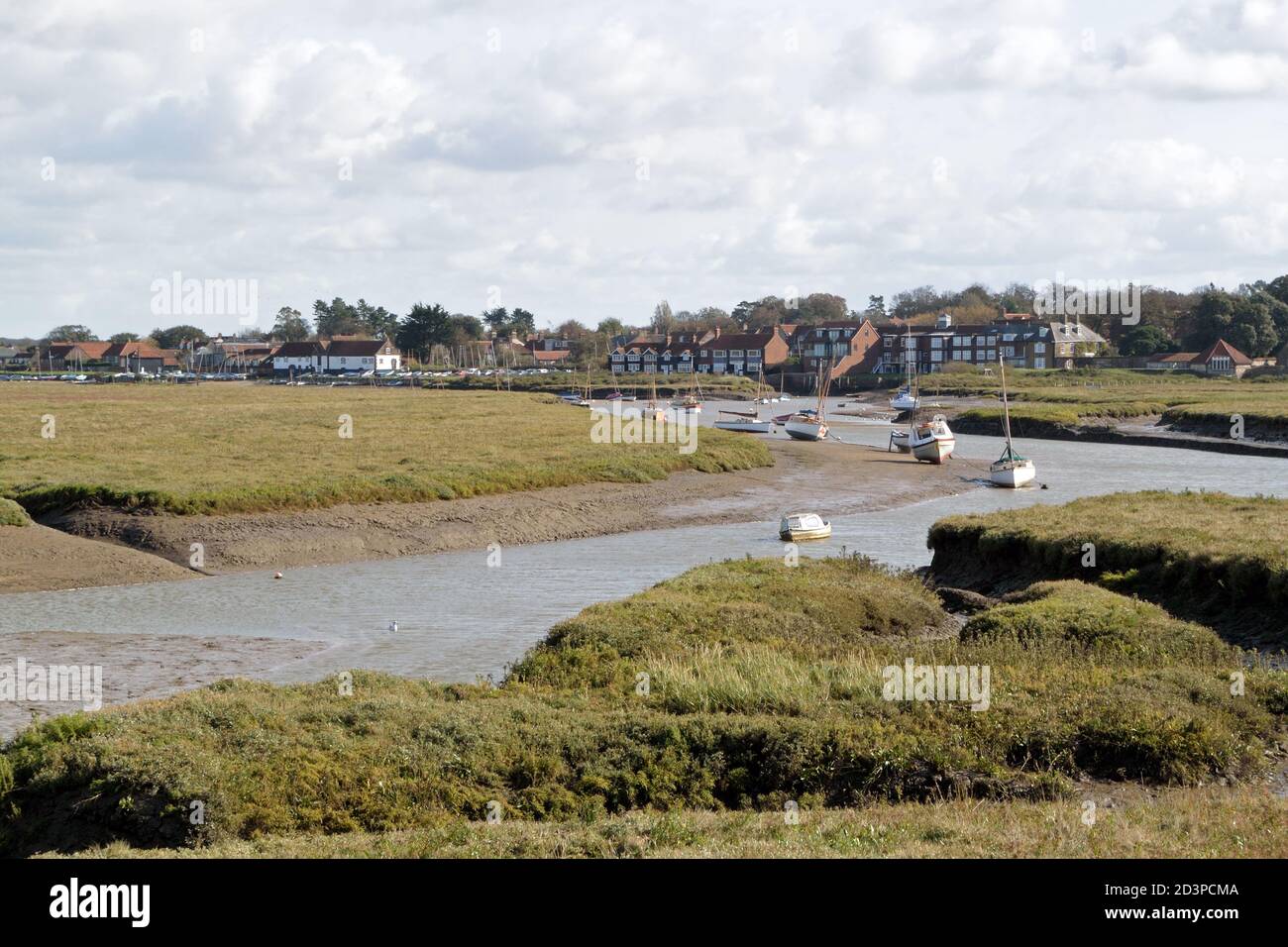 Burnham Overy Staithe seen across the creek from the Norfolk Coast Path National Trail Stock Photo