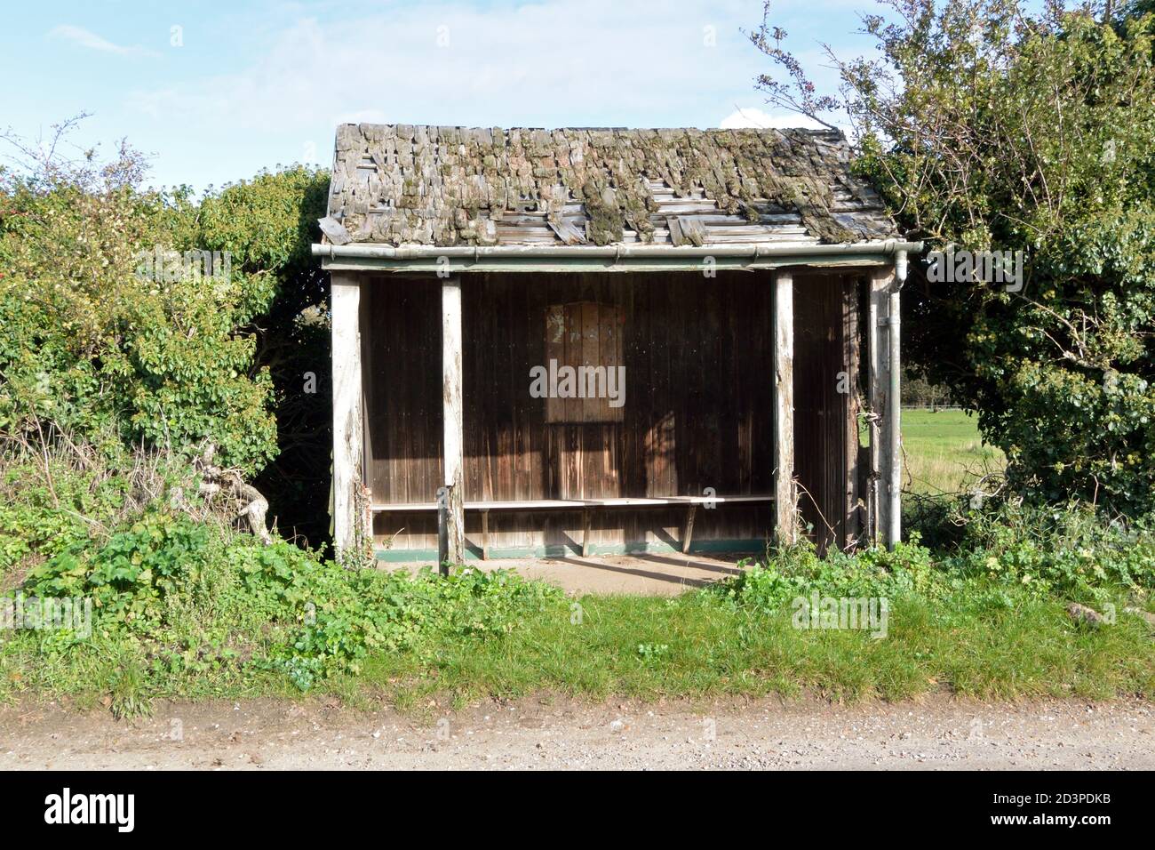 Rustic wooden bus shelter at Burnham Norton, Norfolk, UK Stock Photo